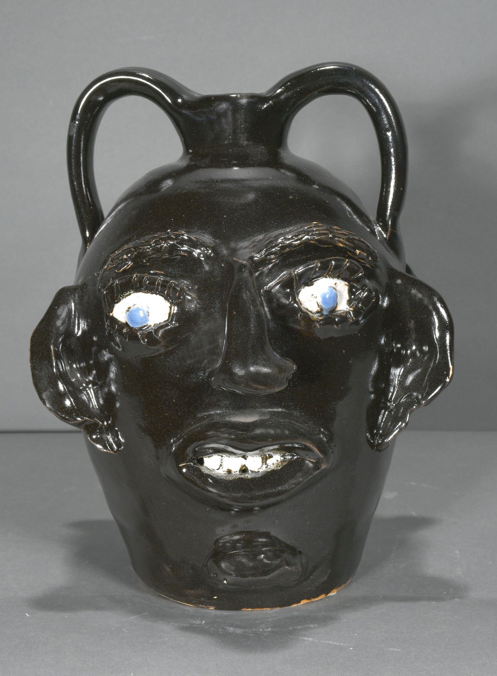Jerry Brown. Double Face Black Glazed Face Jug. (1 of 4)