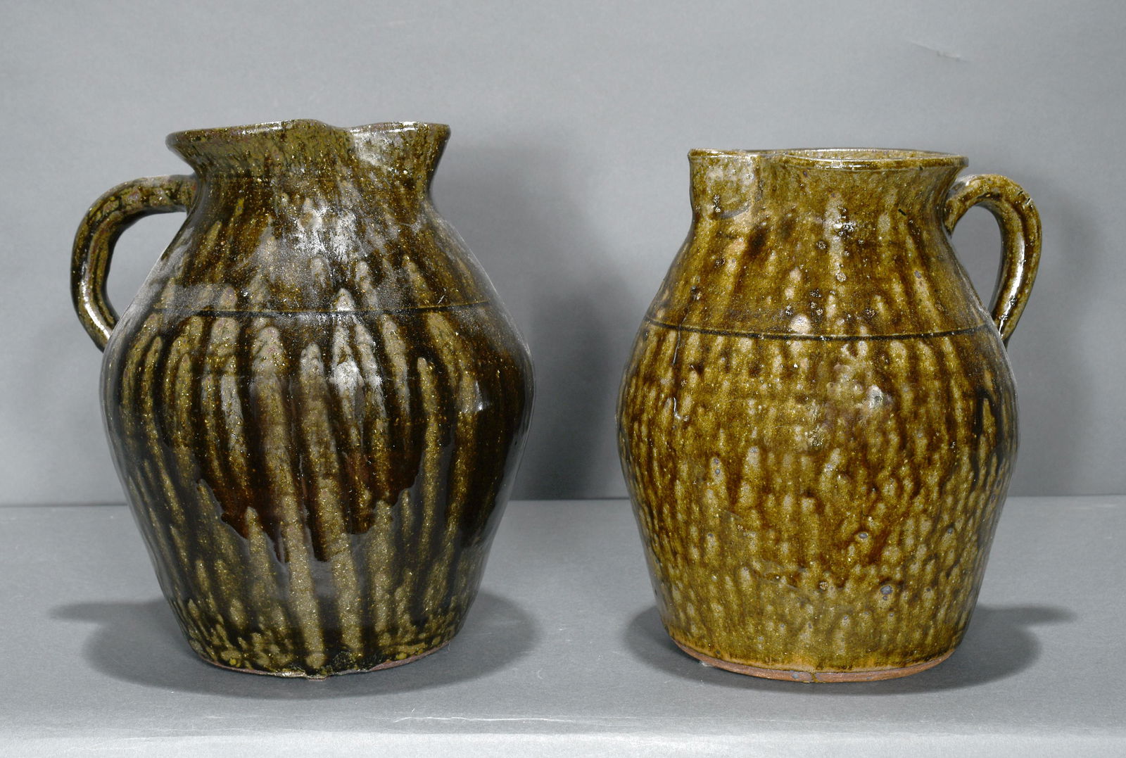 Lanier Meaders. Pair of Tobacco-Spit Pitchers. (1 of 3)