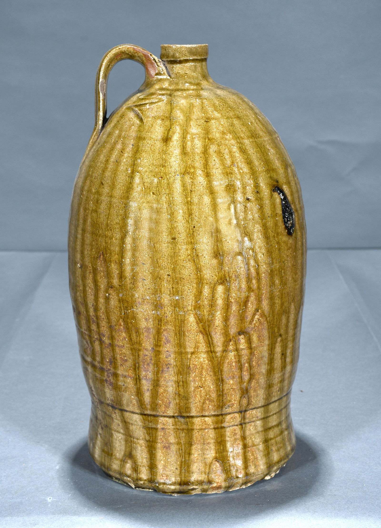 Odd Shaped Whisky Jug with Light Colored Veiny Glaze. (1 of 5)