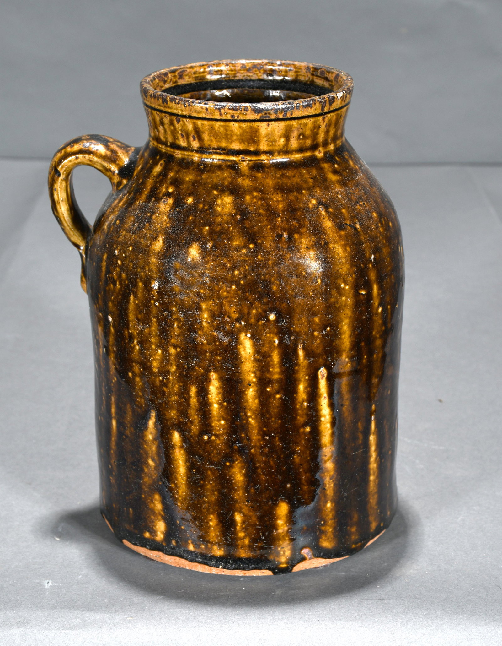 Fermenting Jar with a Dark Molasses Colored Glaze.: Anonymous. One Gallon Fermenting Jar with a Dark Molasses Colored Glaze. Mint condition. 9.5" h. Est. $300-500. Ship: $55