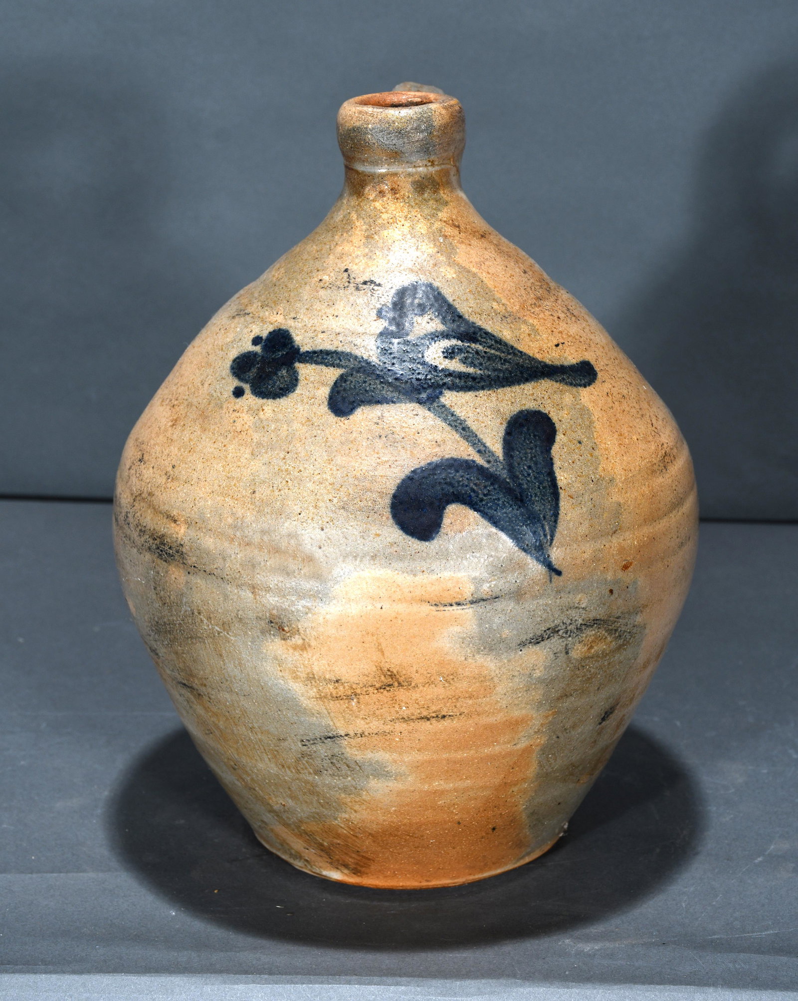 Early Blue Bird on Flower Decorated Gallon Jug.: Anonymous. Early Blue Bird on Flower Decorated Gallon Jug. Mint condition. 10.5" h. Est. $300-500. Ship: $55