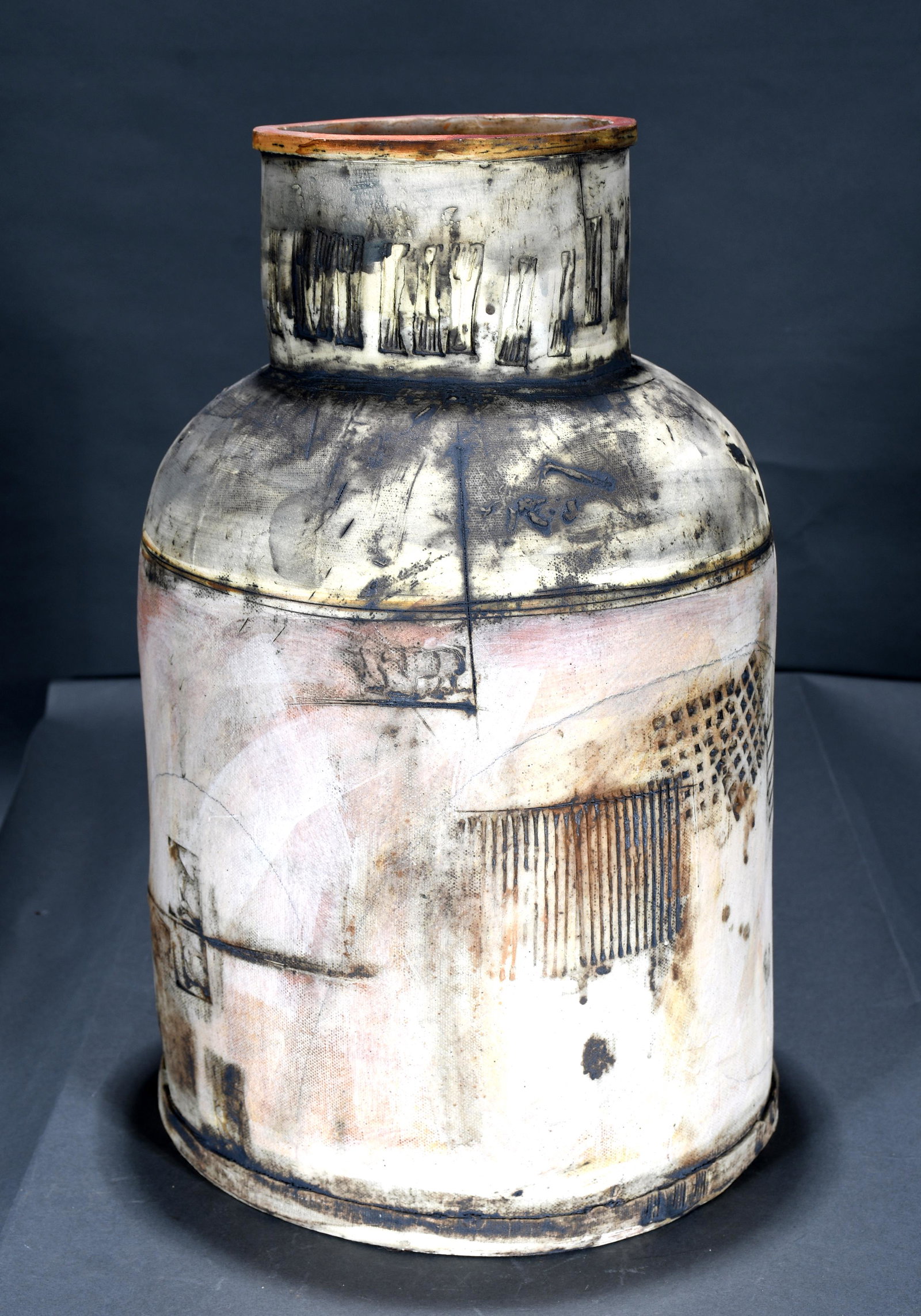 Rob Pulleyn. Arts & Crafts Interpretation Milk Cannister.: Rob Pulleyn. Arts and Crafts Interpretation Milk Cannister. Signed and dated 2007. Mixed media pottery with incised human forms and pitchforks. Mixed media glaze. Mint condition.18" h. Est. $800-1,200