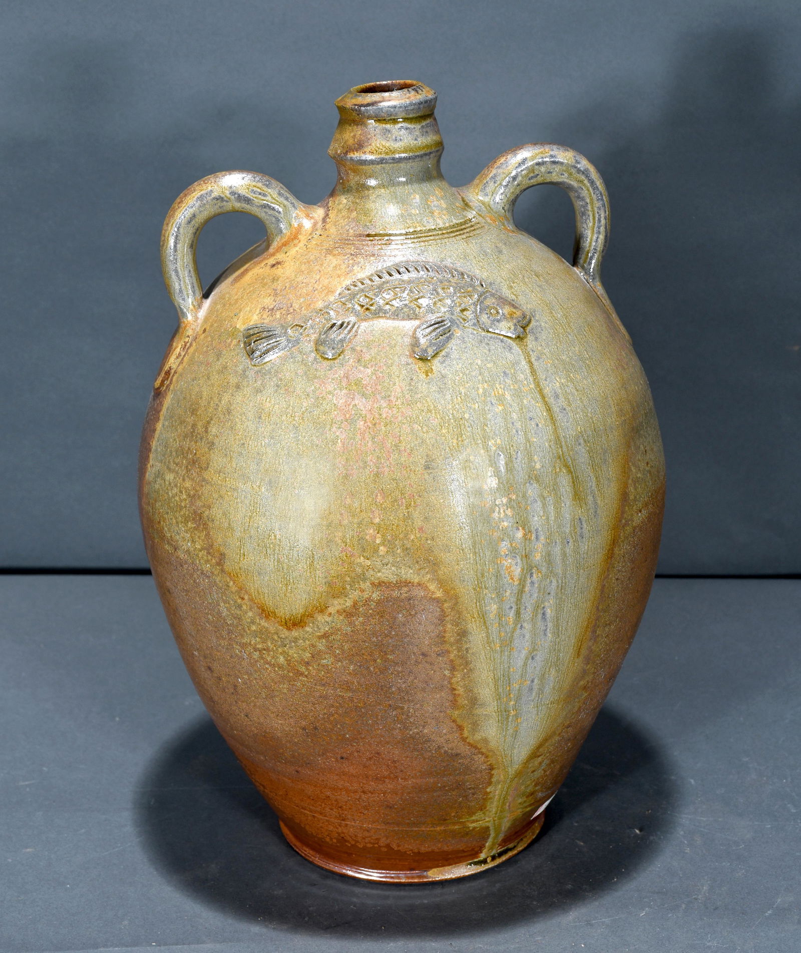 HP. Two Gallon Jug with Fish Decoration. (1 of 4)