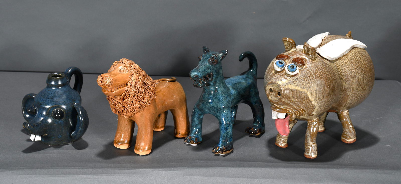 Lin Craven. Four Pottery Animal Figures. (1 of 2)