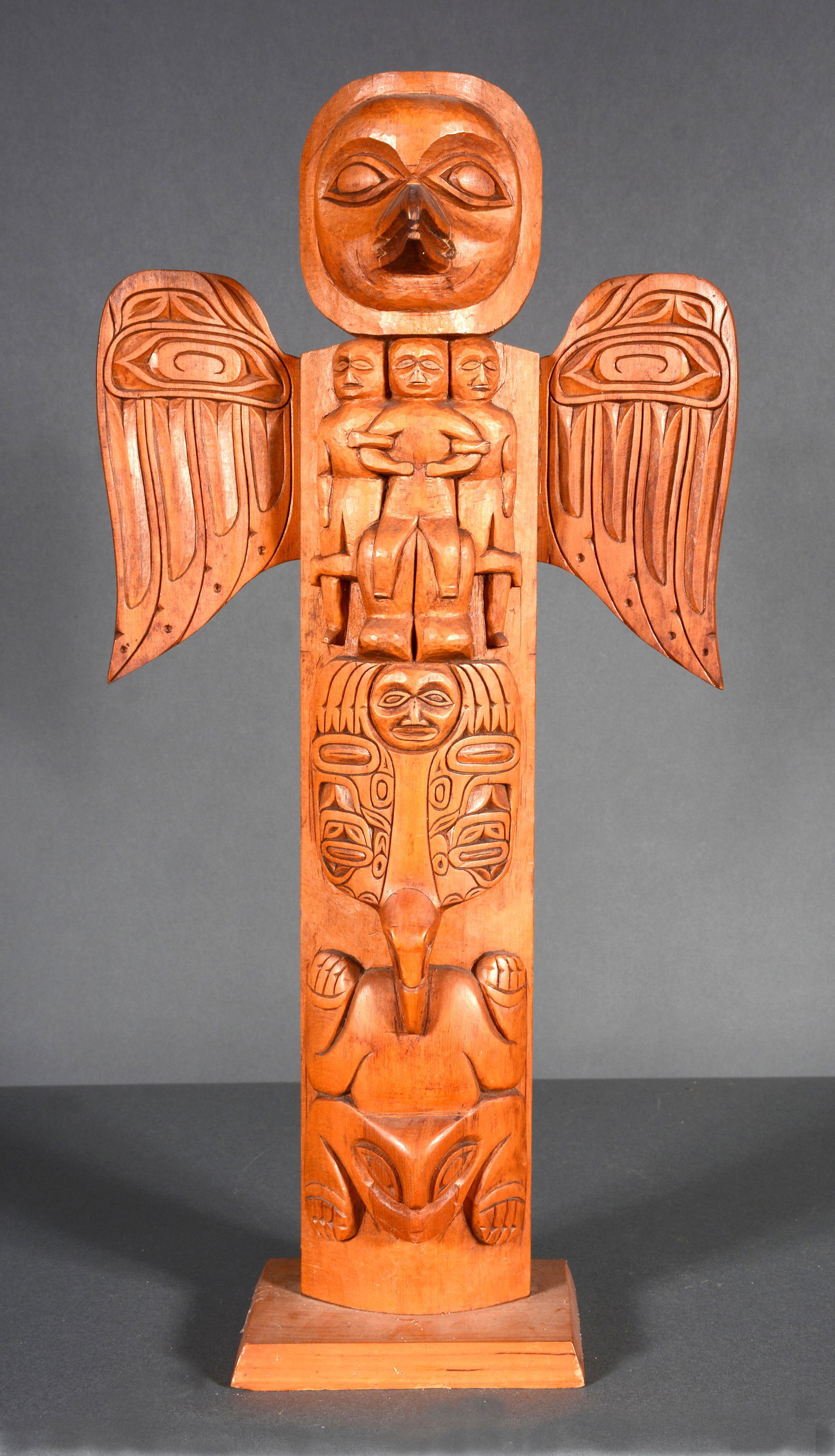 Alex Marko. Sun and Raven Totem.: Alex Marko. Sun and Raven Totem. Signed and titled, but difficult to read. Alaska. Carved and stained wood. Excellent condition. 21" h x 10" w. Est. $300-500. Ship: $45