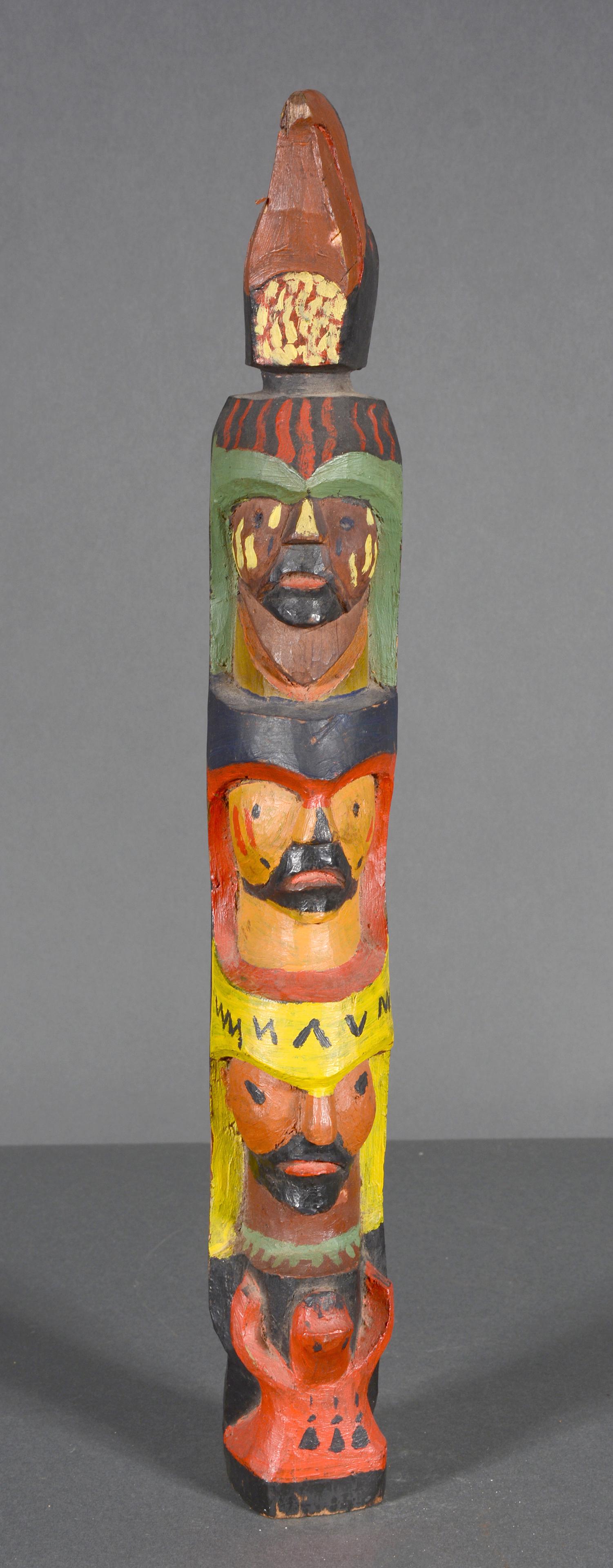 Thunderbird Totem with Three Chiefs.: Thunderbird Totem with Three Chiefs. Not signed. Carved and painted wood. Chip on bird's beak, otherwise excellent condition. 17.5" h. Est. $200-400. Ship: $45