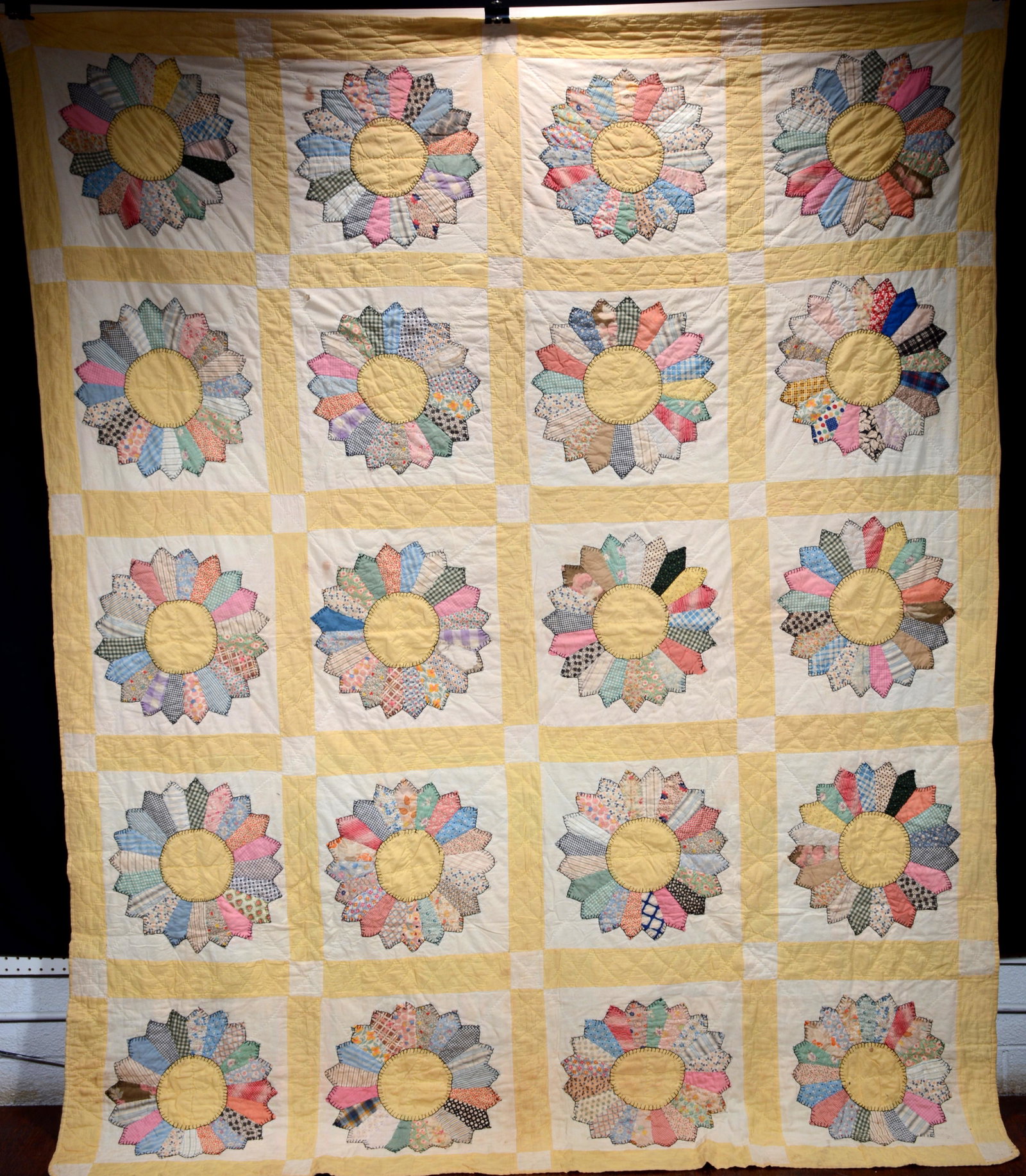 African American Sunflower Quilt.: Anonymous. African American Sunflower Quilt. Hand-stitched cotton piece quilt. A few tears, otherwise good condition. 80" x 98". Est. $600-900. Ship: $45 Note from consignor: Quilt is from the estate 