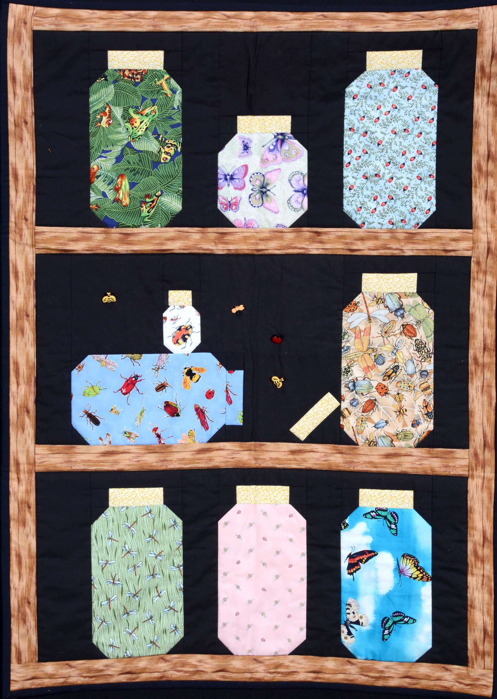 Jars Of Insects Quilt.: Anonymous. Jars Of Insects Quilt. Not signed. Cotton mini quilt. 27" x 36". Provenance: Barbara Hacker Hunter Collection. Est. $100-200. Ship: $25