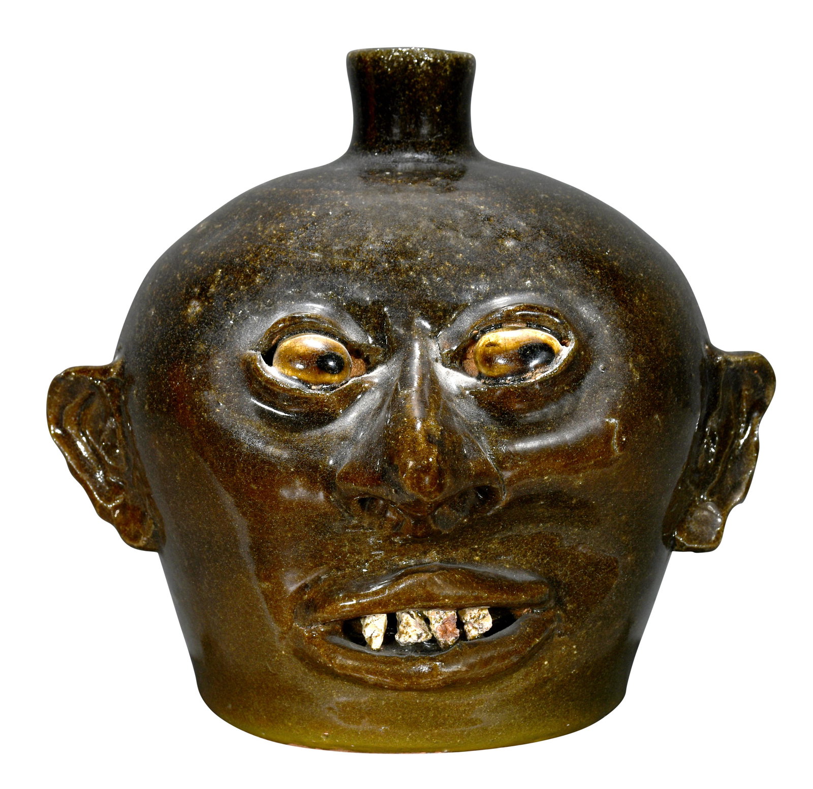 Lanier Meaders. Rock Tooth Face Jug With Glazed Eyes.: Lanier Meaders. Early Rock Tooth Face Jug With Glazed Eyes. c. mid 1960s. Signed. Mint condition. 8" h. Est. $3,000-5,000. Ship: $65