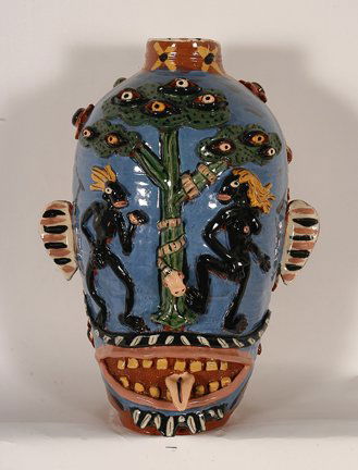 Carl Block. Black Adam & Eve Face Jug.: Flatland Pottery. Highly decorative with figures, trees, flowers and eyes. Multi-colored glaze. Stamped. Mint condition. 16”h, very large. Est. $800-1,000. Ship $75