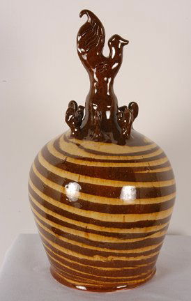 Billy Ray Hussey. Chicken Feed Bank.: Billy Ray Hussey. Chicken Feed Bank. Two-color Swirl jug with chickens on top. Initialed on bottom. Mint condition. 12.5”h. Est. $200-300. Ship; $65