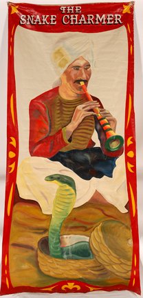 Circus Banner. The Snake Charmer.: Circus Banner. The Snake Charmer. c. 1950’s-60’s. Paint on canvas. Not signed. Some paint loss, otherwise very good condition. 3 ft x 7 ft. Est. $600-900. Ship: $45