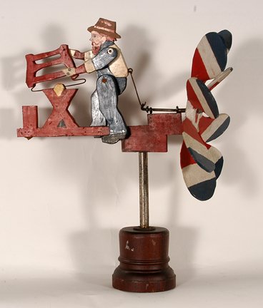 Anonymous. Sawing Man Whirligig.: Anonymous. Red, White & Blue Sawing Man Whirligig. Carved and painted wood. c. 1976 (bi-centennial). Excellent condition. 23”h x 20” x 14. Provenance: The George and Sue Viener Collection. Est. $1