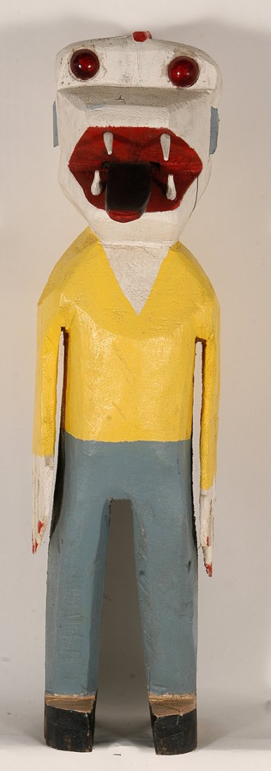 J.L. Nipper. Tennessee Big Foot: J.L. Nipper. Tennessee Big Foot. Chain saw carved wood, paint, plastic eyes. Not signed. Repair to both feet tips and natural wood splits near mouth, otherwise good condition. 38”x 10” x 10”. Es