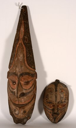 Papua New Guinea. Pair of Oceanic Masks: Papua New Guinea. Oceanic Masks. Carved wood, paint, with seashells. Excellent condition. Tallest is 22”h. Est. $200-400. Ship: $45