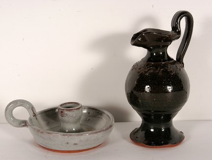 B. Ferguson & M. Meaders. Pottery.: Bobby Ferguson & Mildred Meaders. Pitcher and Candleholder. Pitcher by Ferguson is 7 h. Both are mint condition. Mildred's candleholder is signed, #1. Est. $50-100. Ship: $35