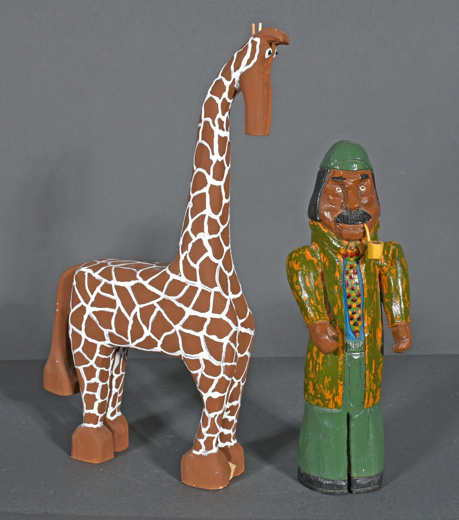 Minnie Adkins & Virgil Perry. Giraffe & Man.: Minnie Adkins & Virgil Perry. Giraffe and Man. 1993-2013. Signed and dated. Carved and painted wood. Excellent condition. Tallest is 15". Est. $200-300. Ship: $65