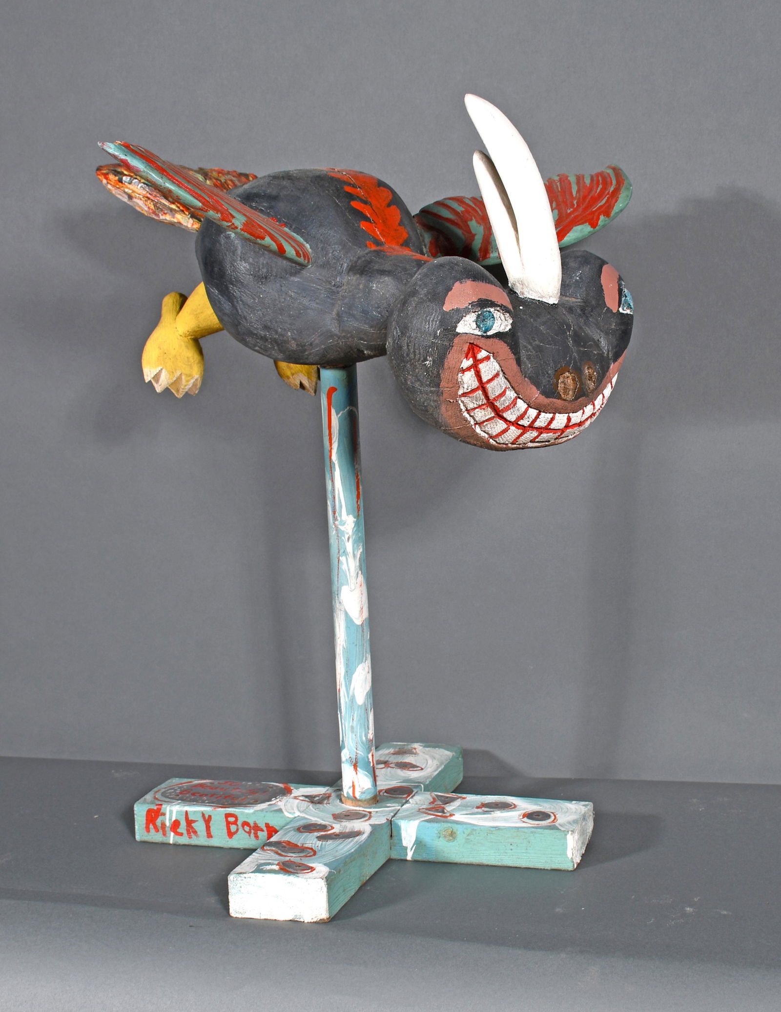 Ricky Barnes. Smiling Bee.: Ricky Barnes. Smiling Bee. 1985. Signed. Dated. Carved and painted wood. Chip on right wing and natural wood splits otherwise good condition. 26" x 23" x 21". Est. $200-300. Ship: $200