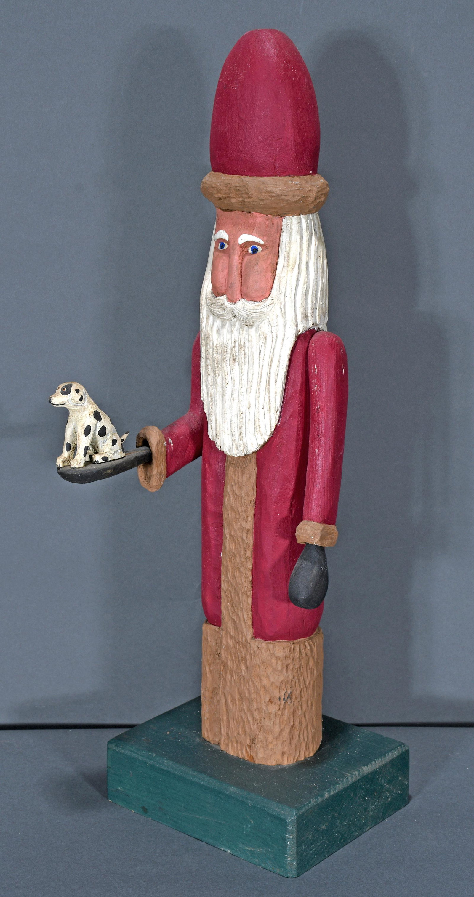 Roy Minshew. Santa With Dalmation Puppy.: Roy Minshew. Santa With Dalmatian Puppy. 1989. Signed and dated. Carved and painted wood. 21"h. Est. $200-400. Ship: $55
