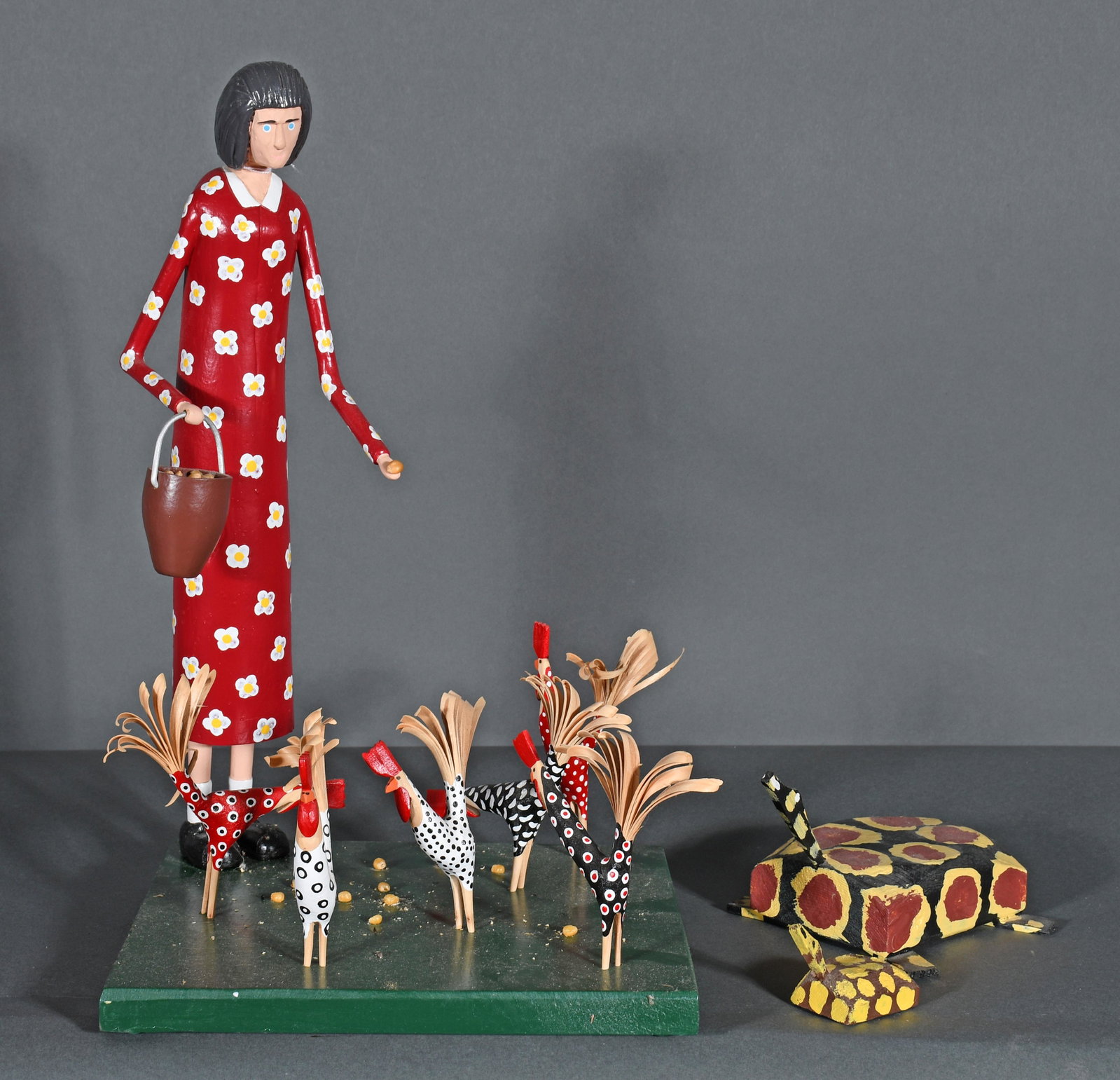 Lonnie & Twyla Money & J. H. Jennings. Lady Feeding Chickens & Turtles.: Lonnie and Twyla Money. Lady Feeding Chickens. Turtles by James Harold Jennings. Carved and painted wood. Excellent condition. Tallest is 17"h x 10" x 10". Est. $100-200. Ship: $65