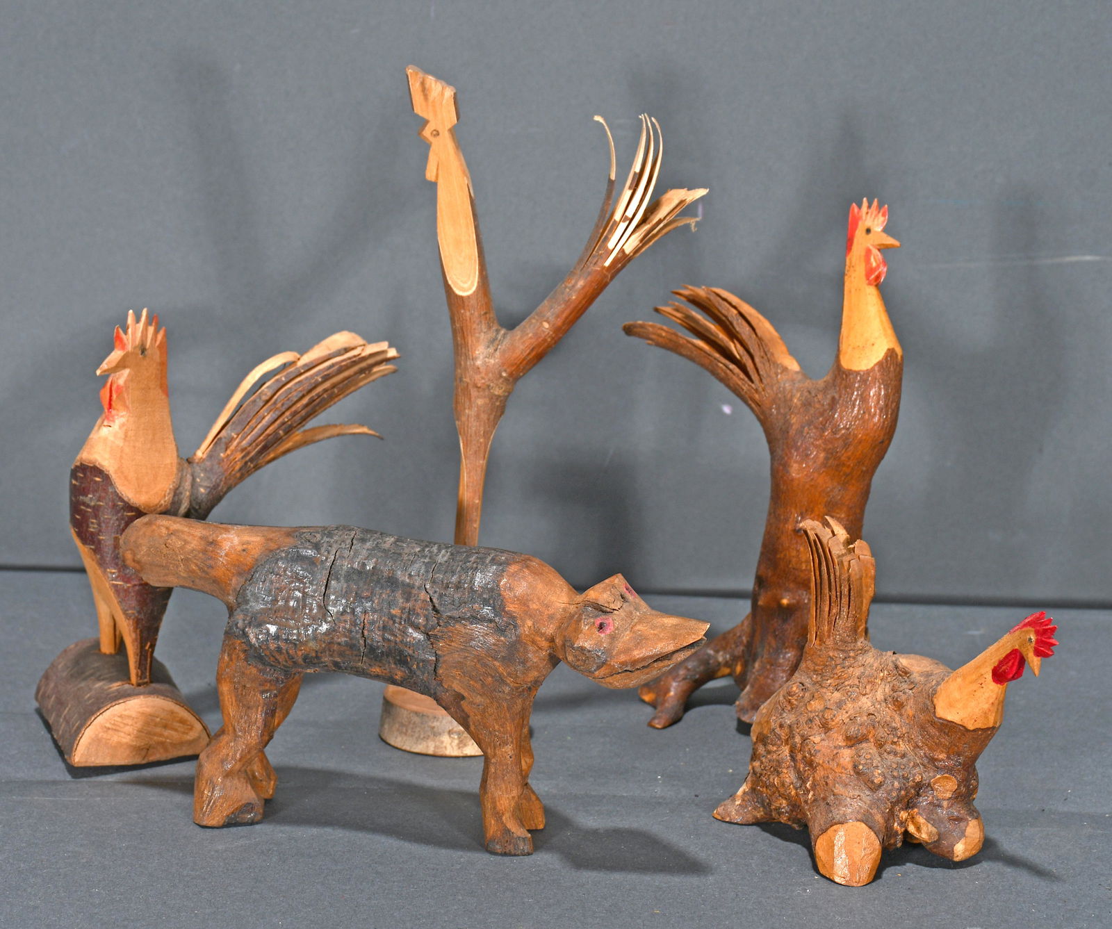 Willard Watson. 4 Chickens & Dog.: Willard Watson. Four Chickens and A Dog. Carved found wood. Great condition. Tallest is 8"h. Est. $50-100. Ship: $45