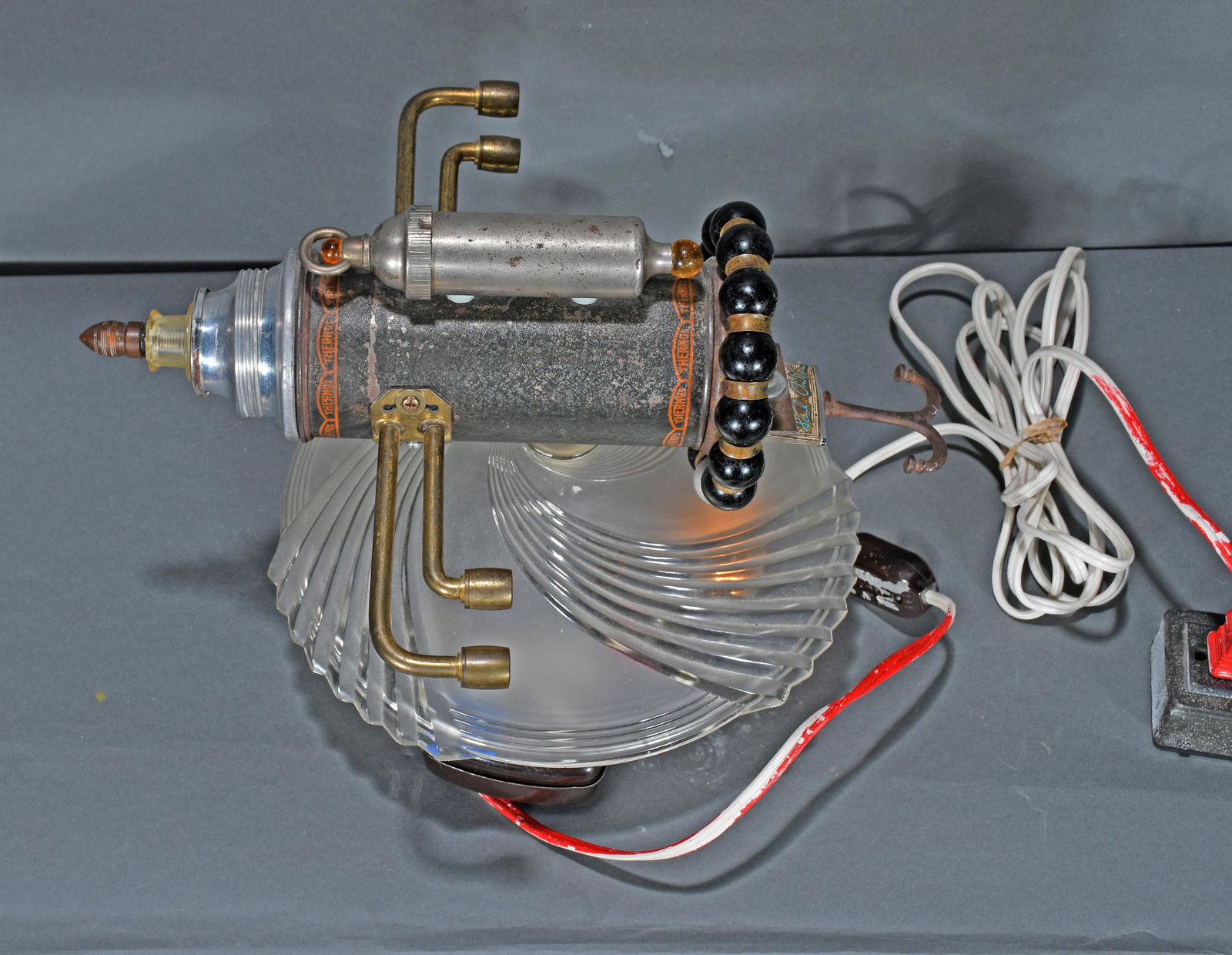 Jimmy Descant. Brown Thermos Rocket Light. (1 of 5)