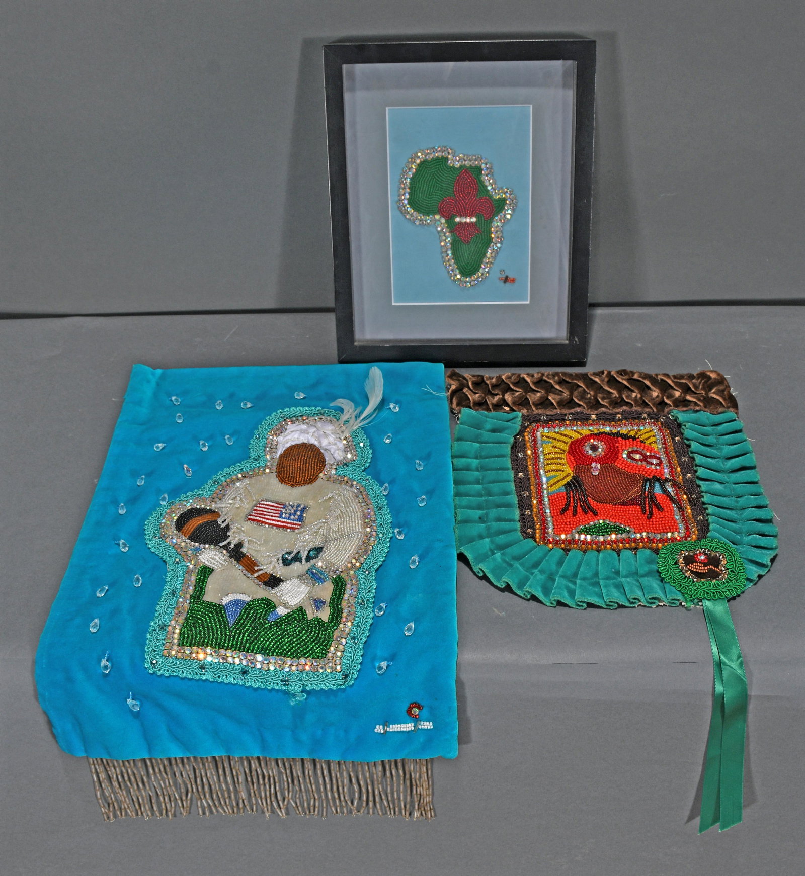 Harrison Nelson. 3 Mardis Gras Indian Works.: Harrison Nelson & Unknown. Three Mardis Gras Indian Works. Signed. Hand sewn bead and sequins backed to fabric. Excellent condition. Largest is 10" x 18". Est. $200-300. Ship: $45