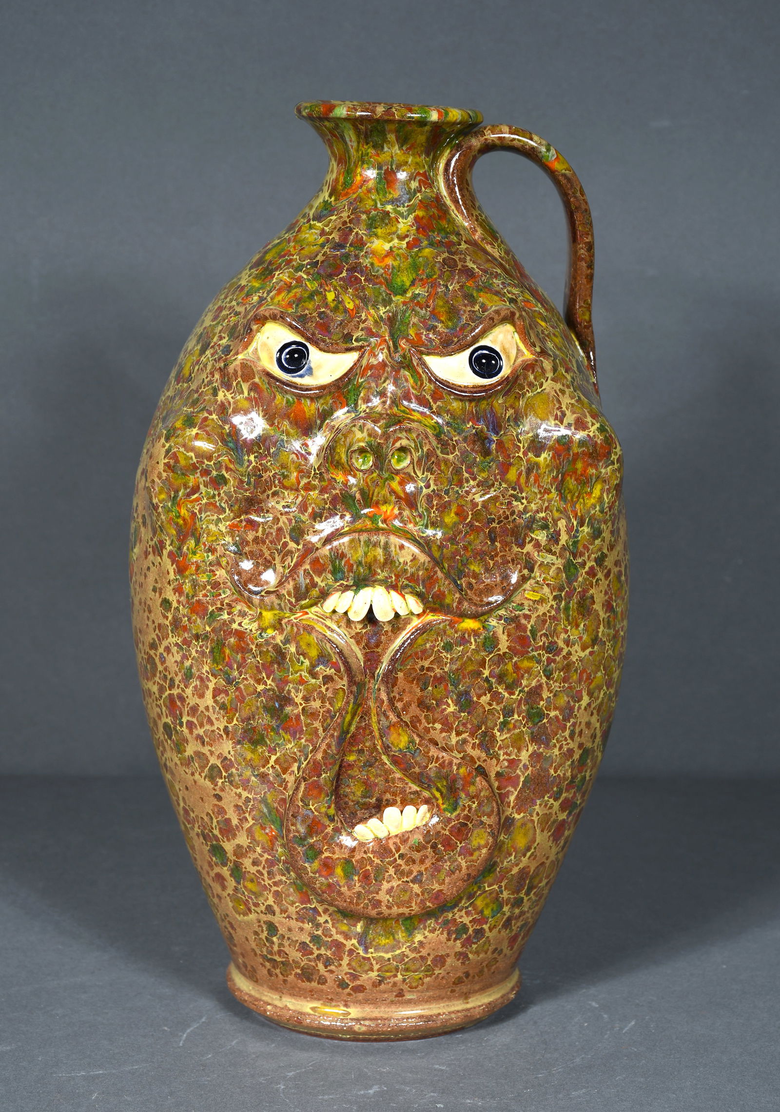 Roger Corn.  Wall Hanging Face Flask. (1 of 3)