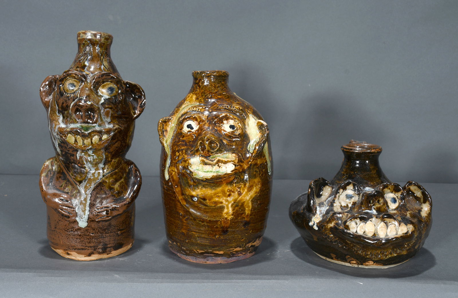 Marie Rogers.  Three Face Jugs. (1 of 2)
