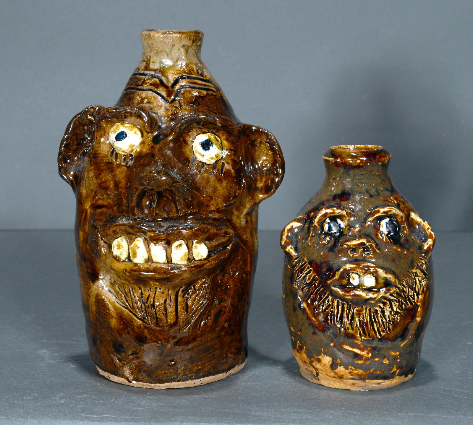 Marie Rogers.   Pair of Small Face Jugs. (1 of 3)