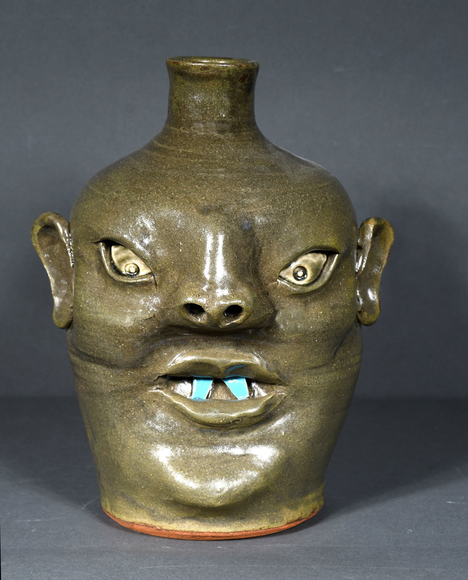 David Meaders.  Green Vampire Face Jug. (1 of 3)