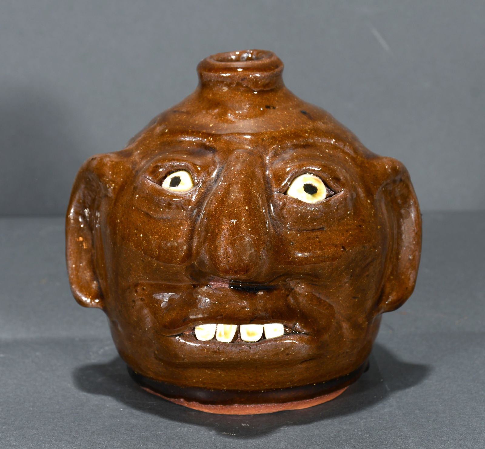 Reggie Meaders.  Pint Size Face Jug. (1 of 3)