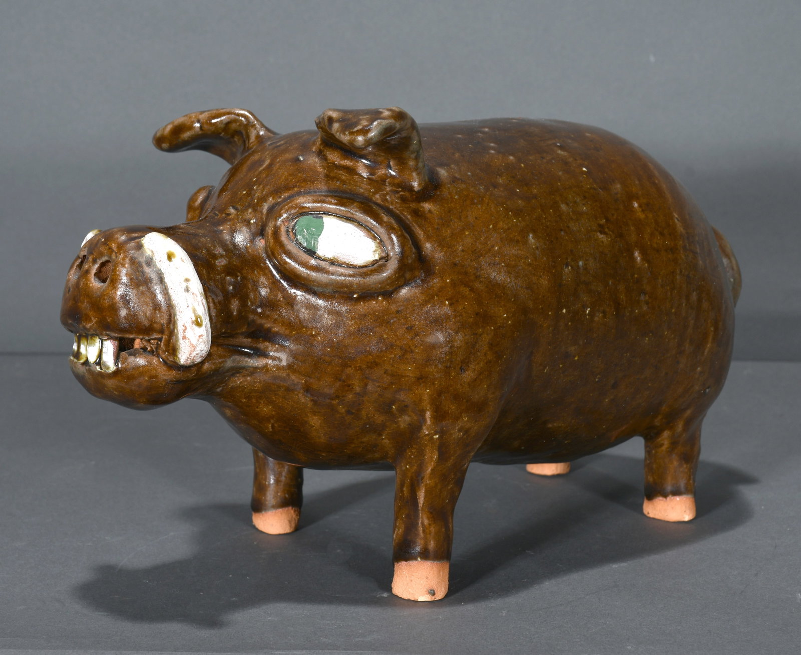 Reggie Meaders. Green-Eyed Warthog.: Reggie Meaders. Green-Eyed Warthog. Signed. Mint condition. 11" long. Est. $300-500. Ship: $55