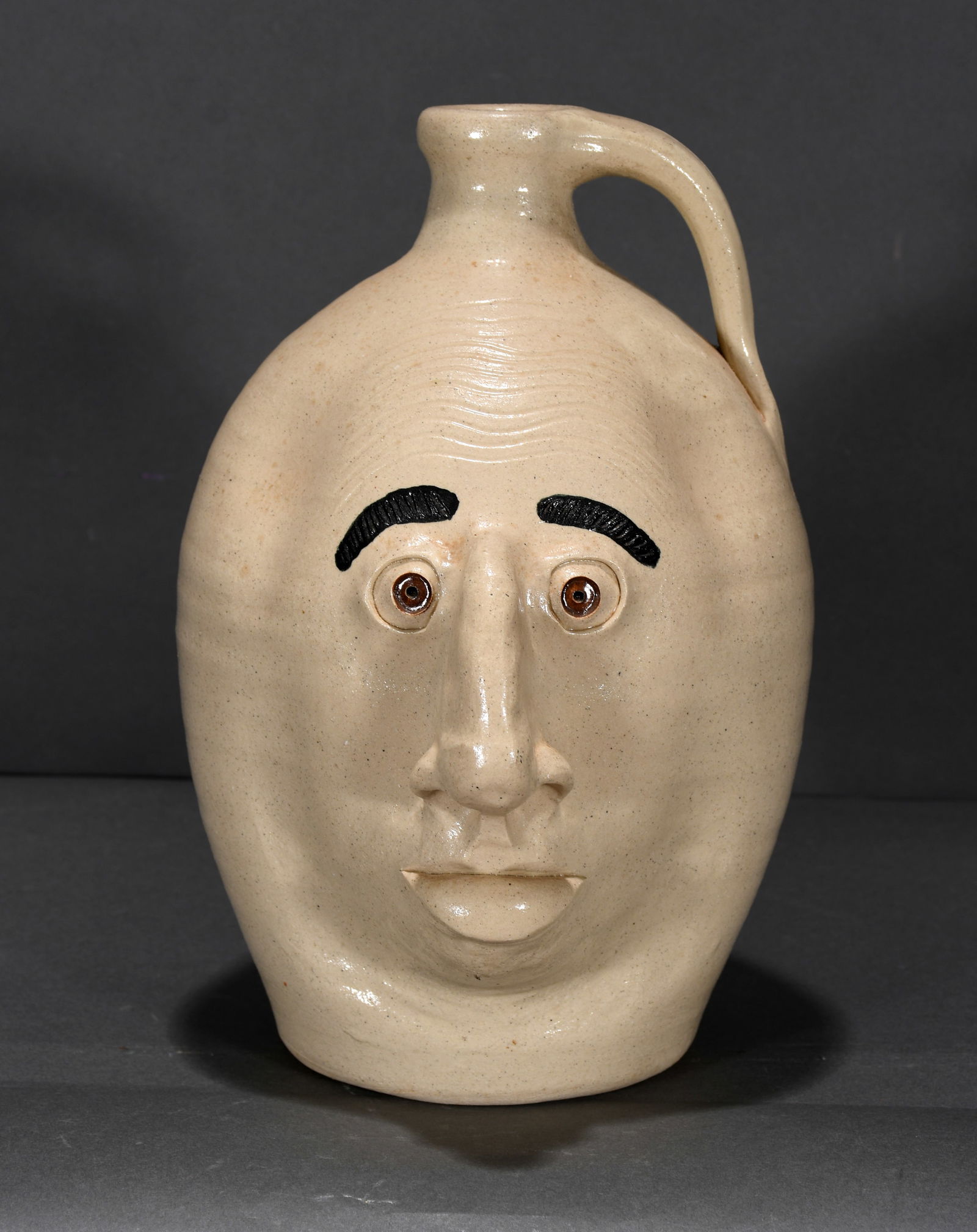 Melvin and Michael Crocker.  White Face Jug. (1 of 3)