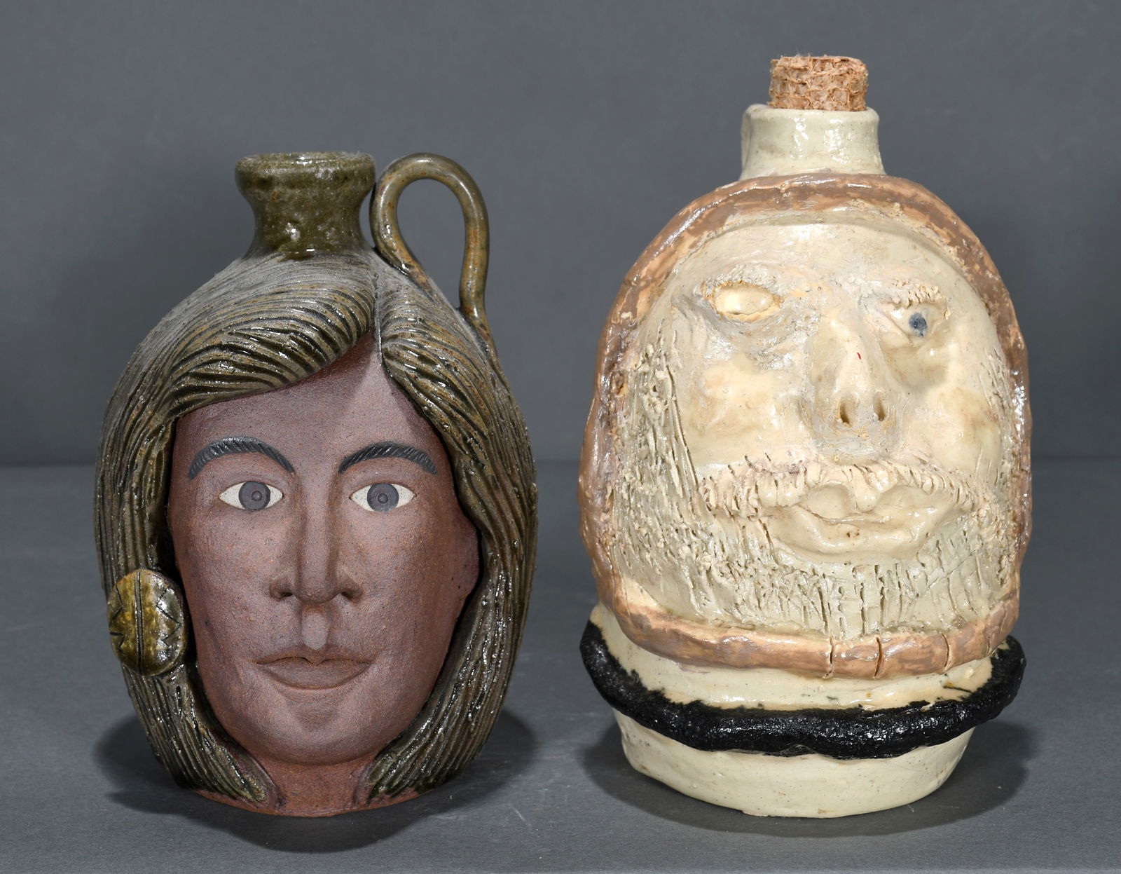 Crocker and Rogers.  Two Face Jugs. (1 of 3)