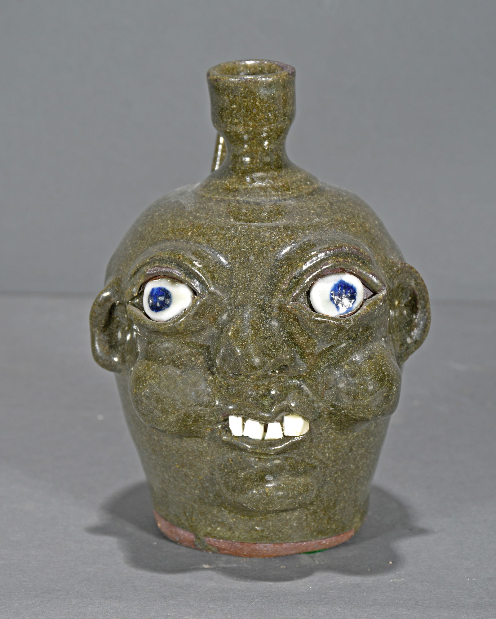 Harold and Grace Nell Hewell.  Pint Size Face Jug. (1 of 3)