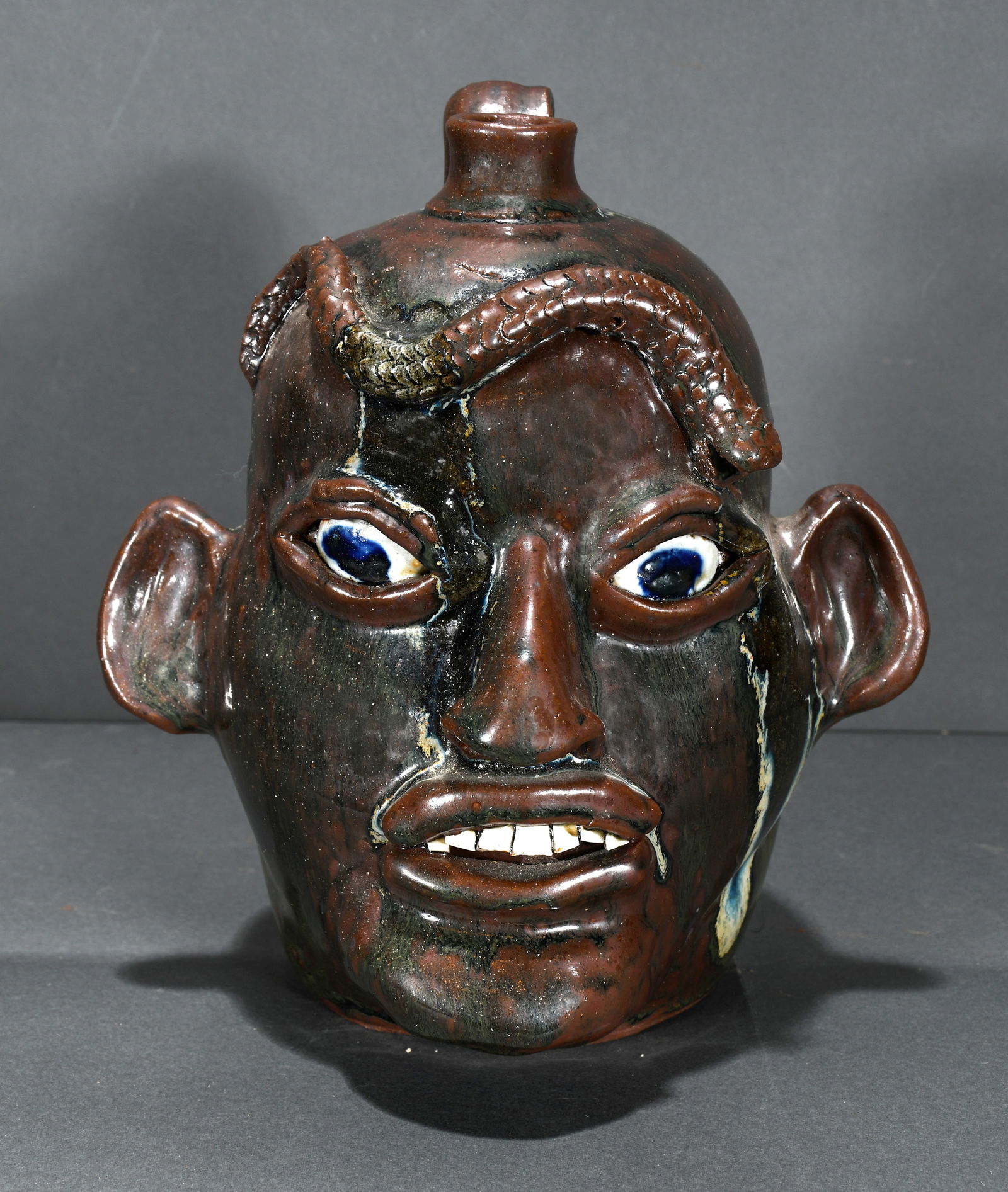 Matthew Hewell.  Face Jug with Snake and Glass Drips. (1 of 3)