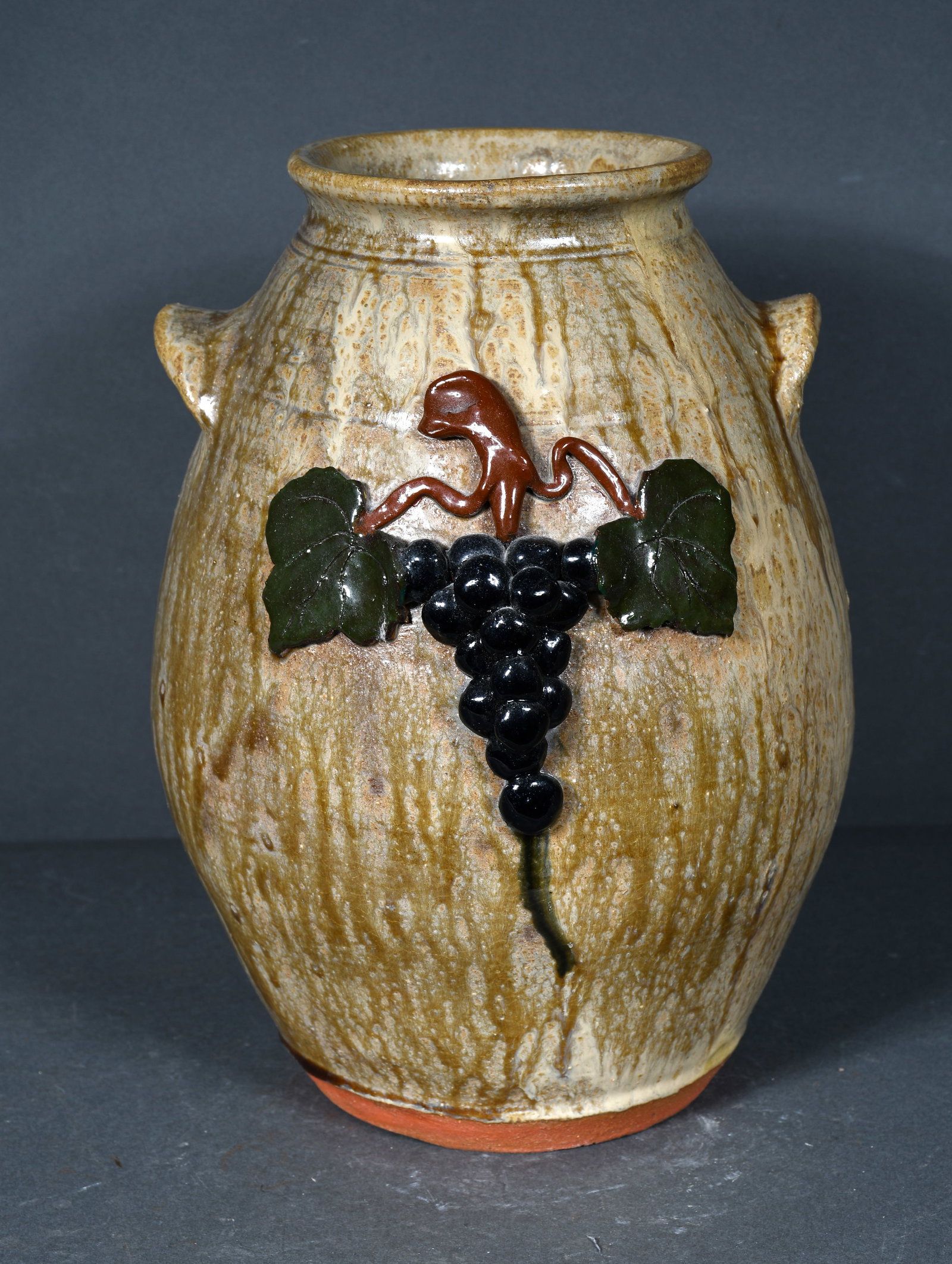 Brian Wilson. Grape Decorated Crock.: Brian Wilson. Grape Decorated Crock. 2000. Signed and dated. Mint condition. 12" h. Est. $100-200. Ship: $55