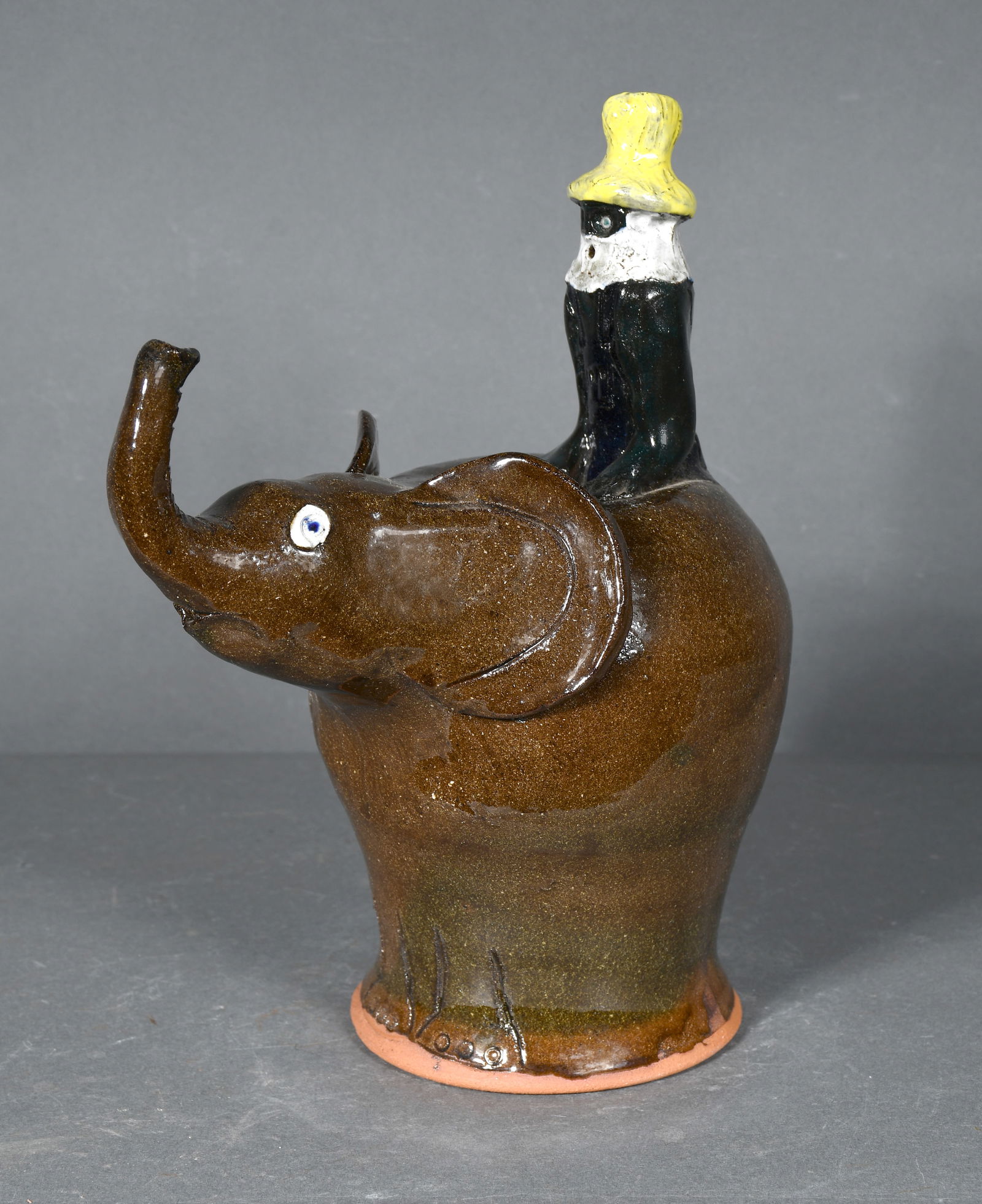 Mike Hanning.  Man Riding Elephant. (1 of 3)