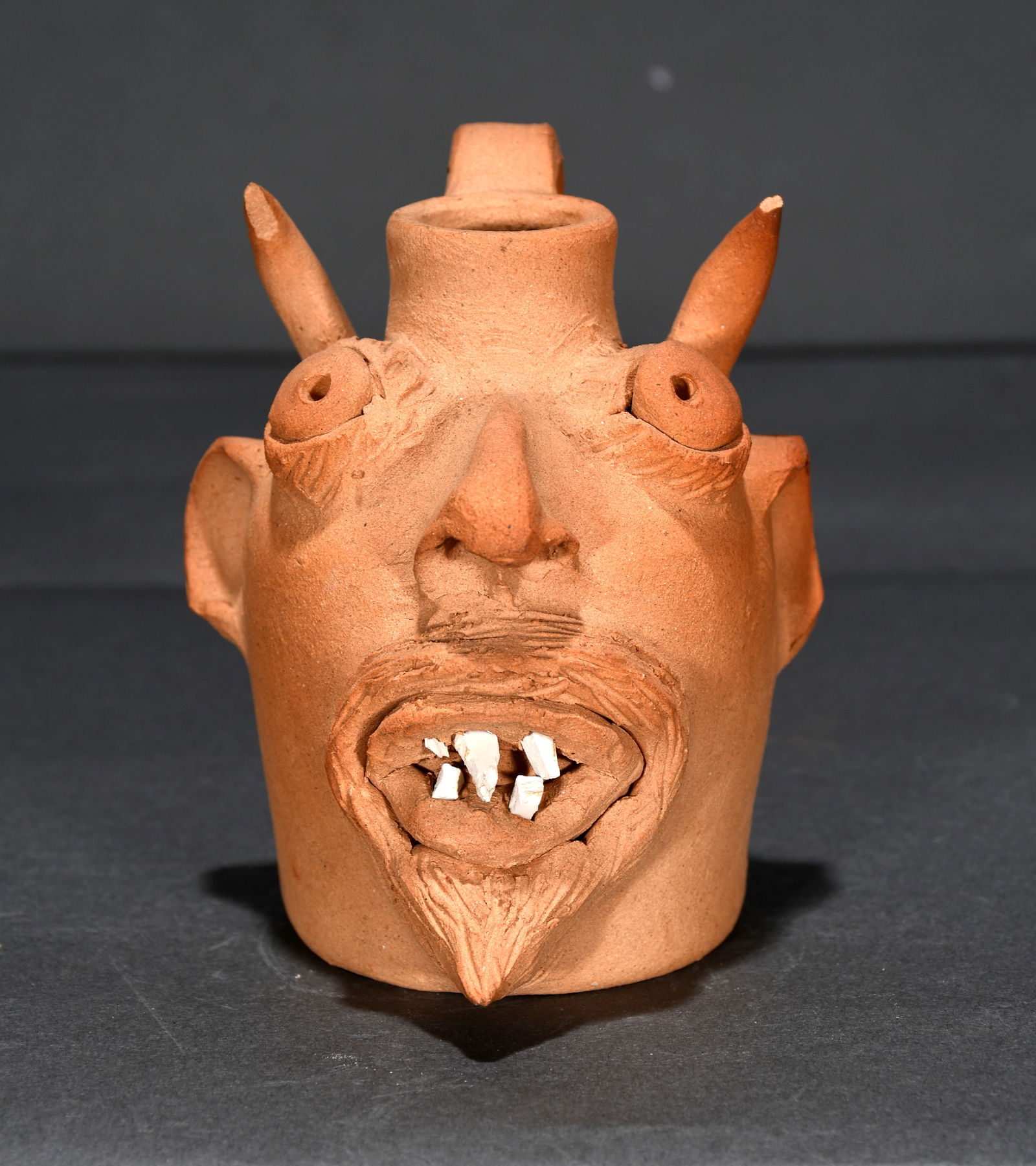 Brown's Pottery.  Mini Unglazed Devil Jug. (1 of 3)