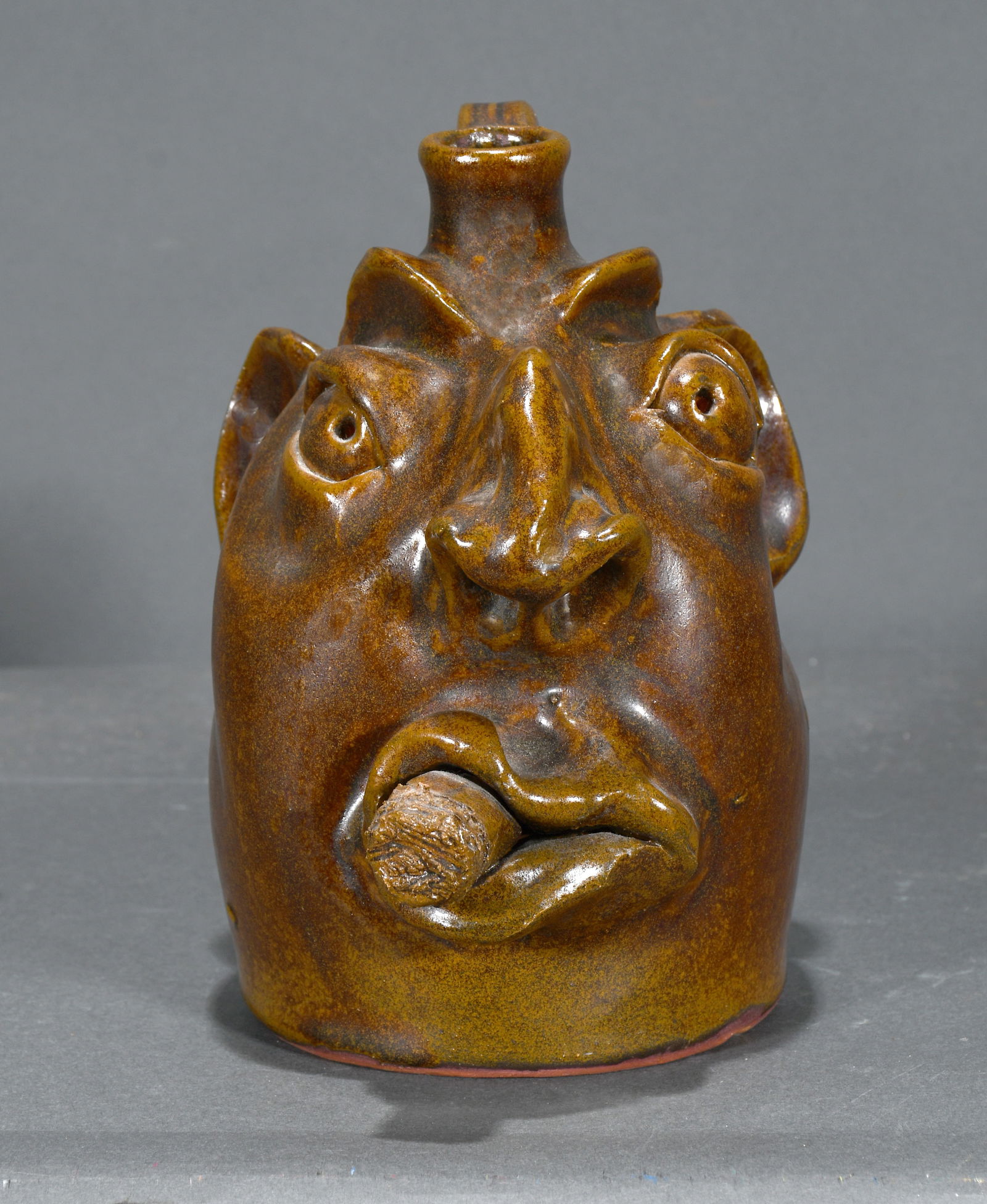 Robert Brown.  Face Jug with Cigar. (1 of 3)