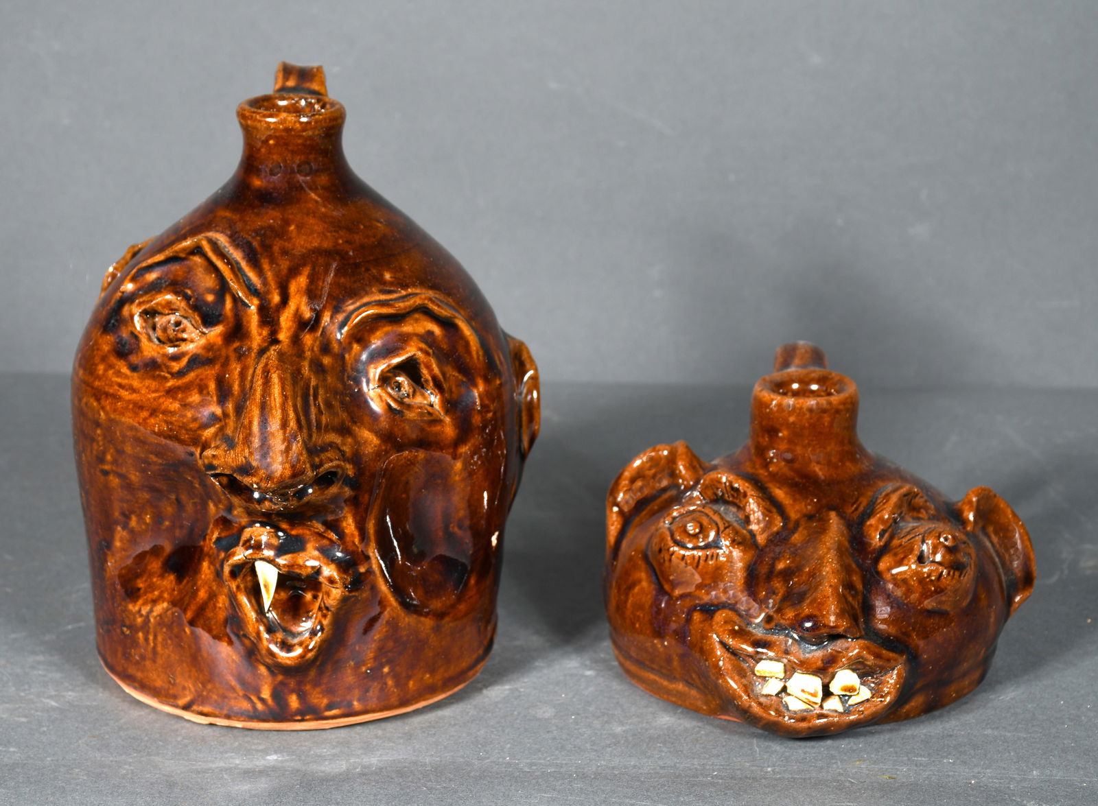 Louis Brown.  Pair of Face Jugs. (1 of 4)