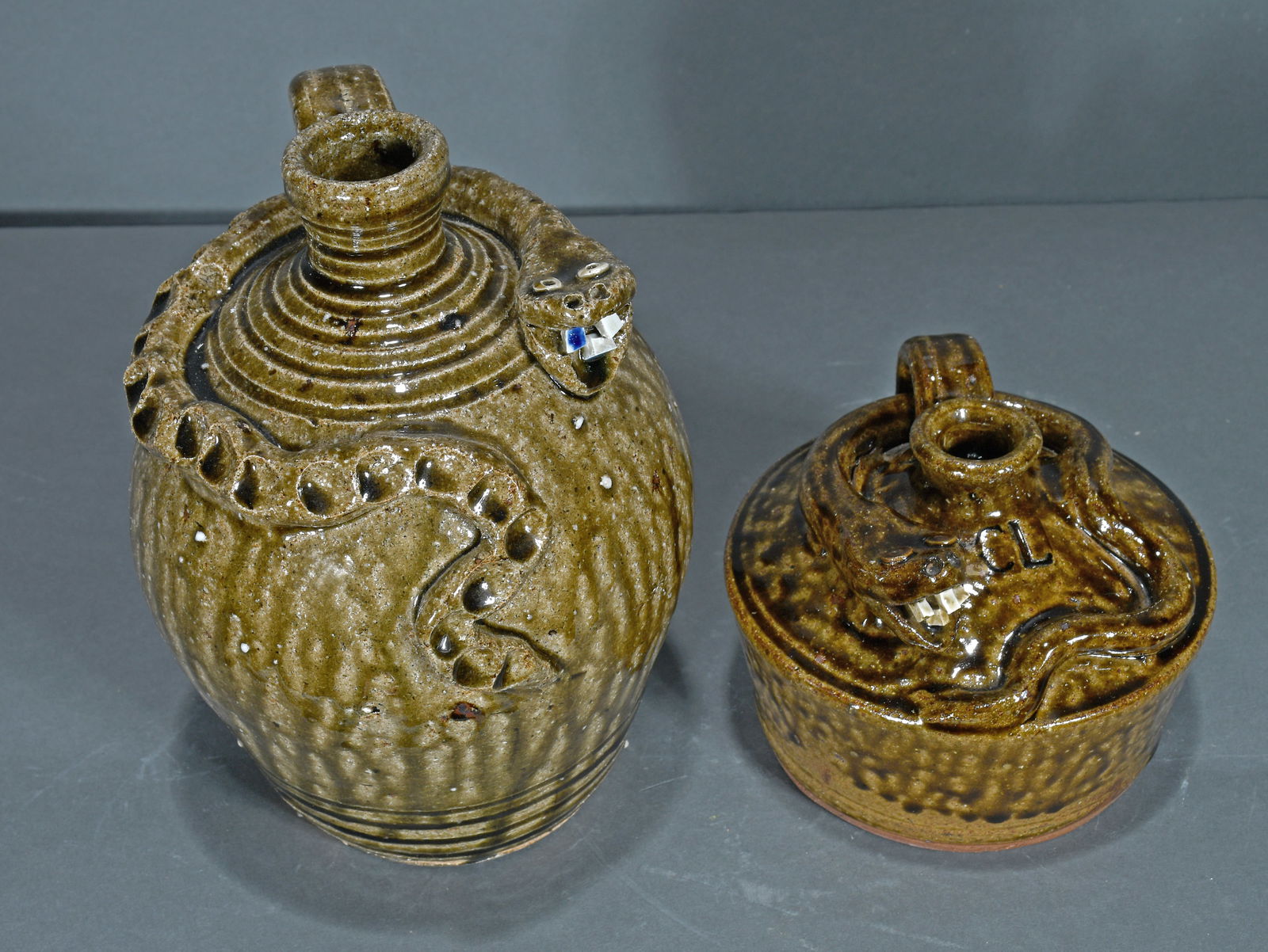 Charles Lisk.   Half Gallon Snake Jug and Buggy Snake Jug. (1 of 4)