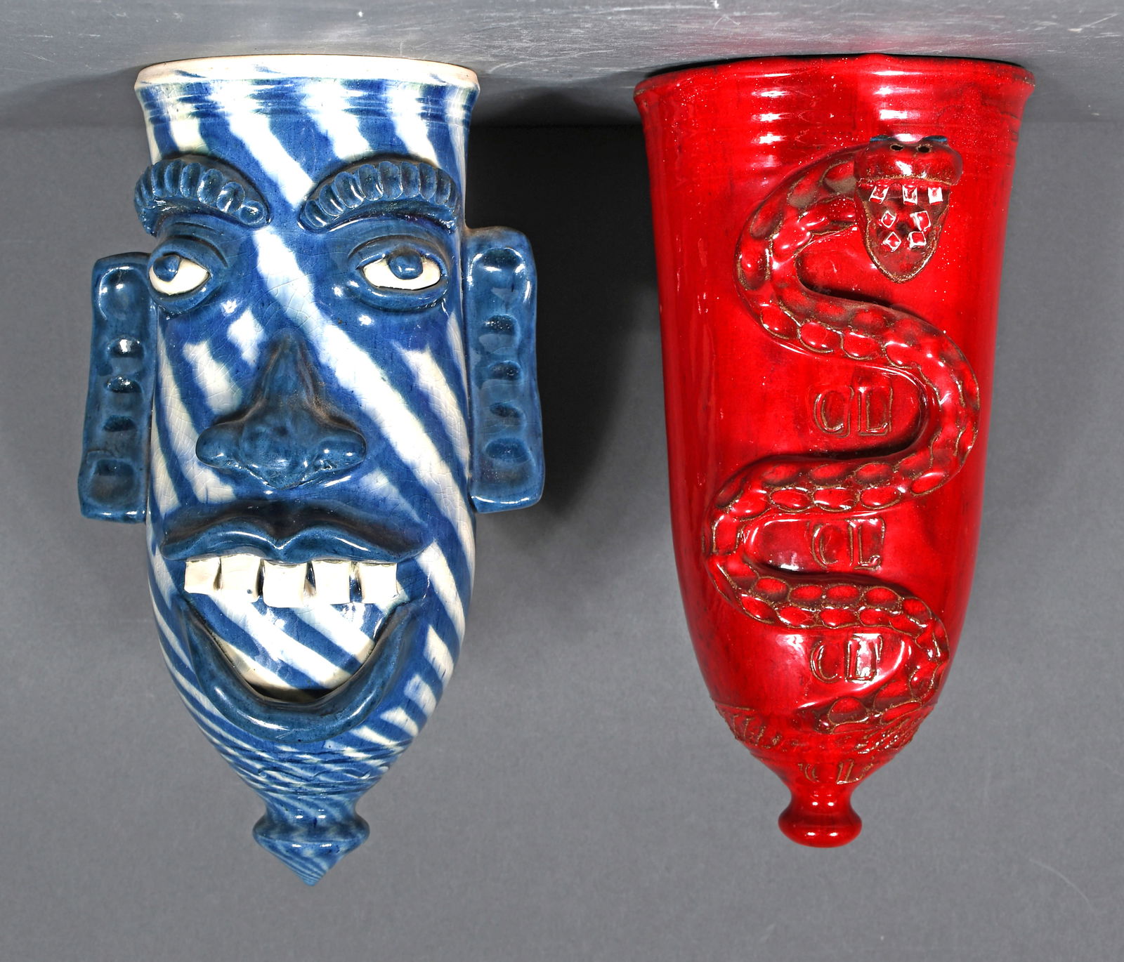 Charles Lisk and A.V. Smith.  Red Snake Wall Pocket & Blue Swirl Face Pocket. (1 of 3)