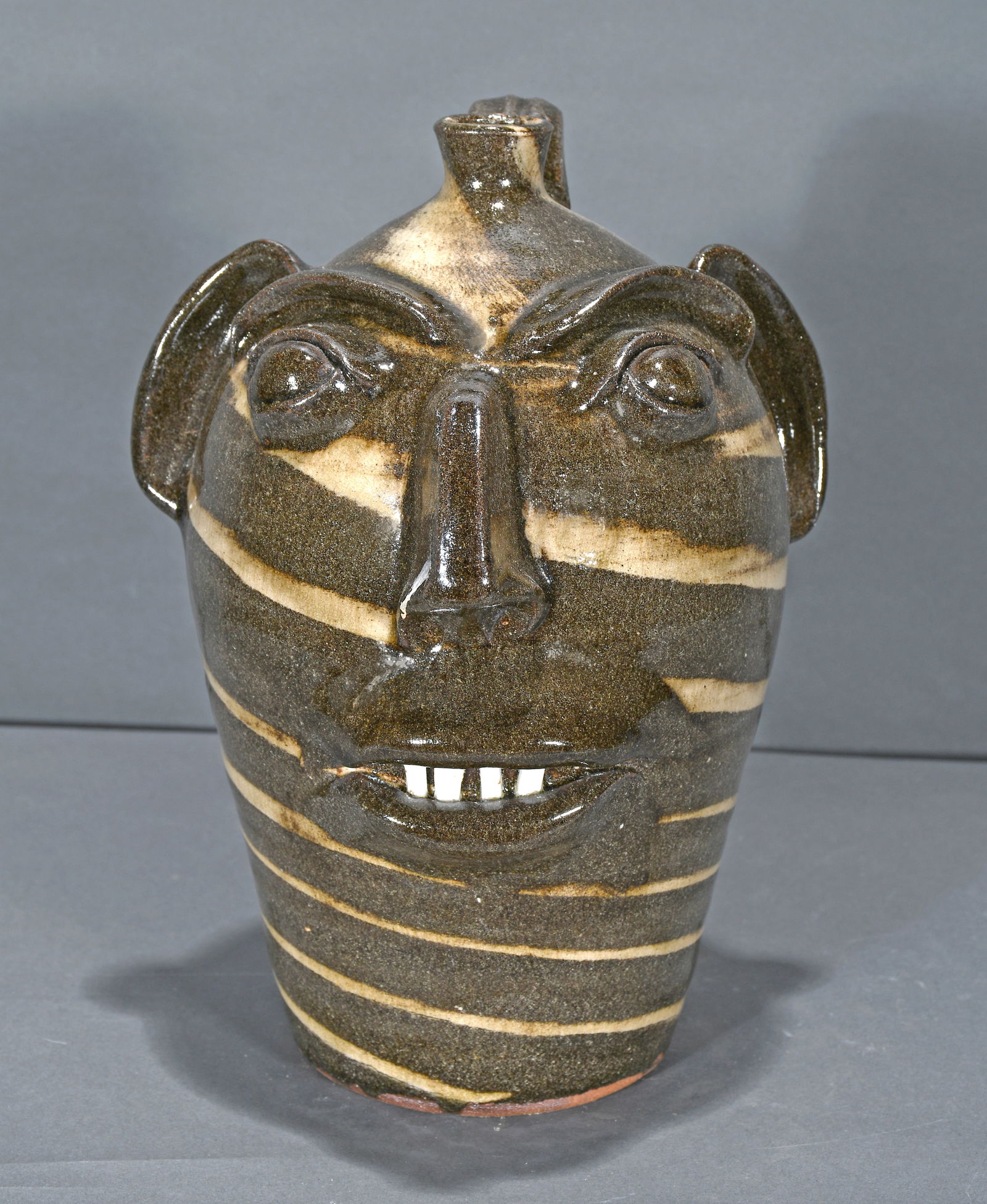 Michel Bayne.  Two Color Swirl Face Jug. (1 of 3)