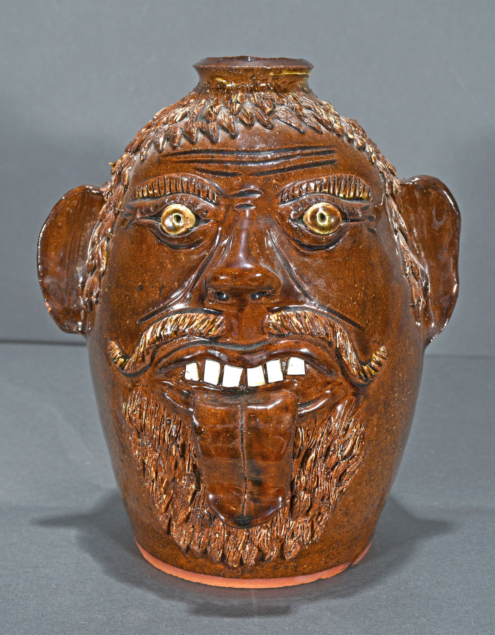 Albert Hodge. Brown Face Jug. (1 of 3)