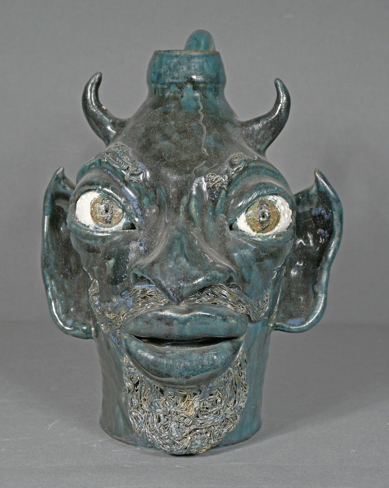 Lin Craven.  Blue Devil Face Jug. (1 of 3)