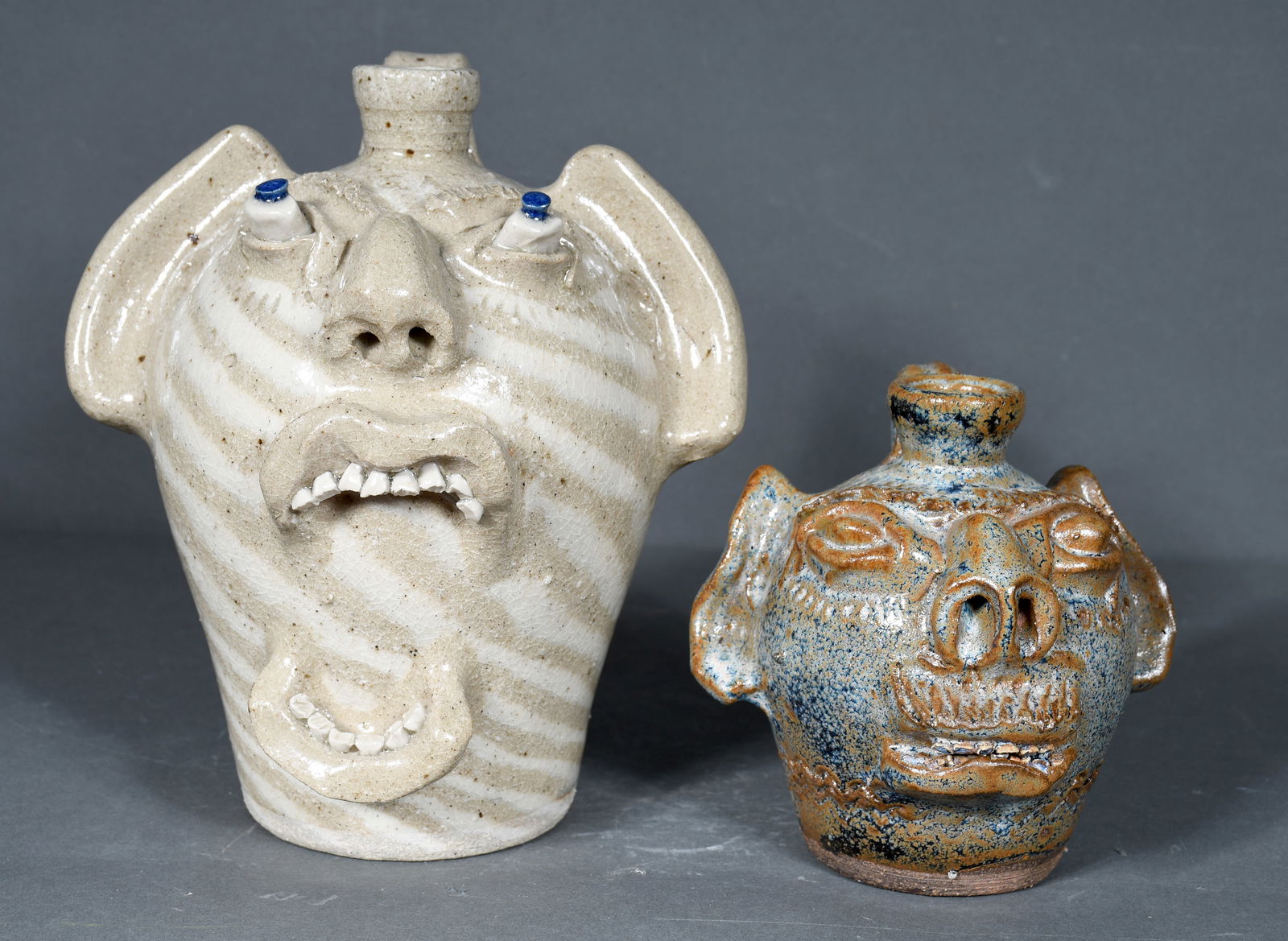 Steve Abee.  Swirl Face Jug and Half Pint Face Jug. (1 of 3)