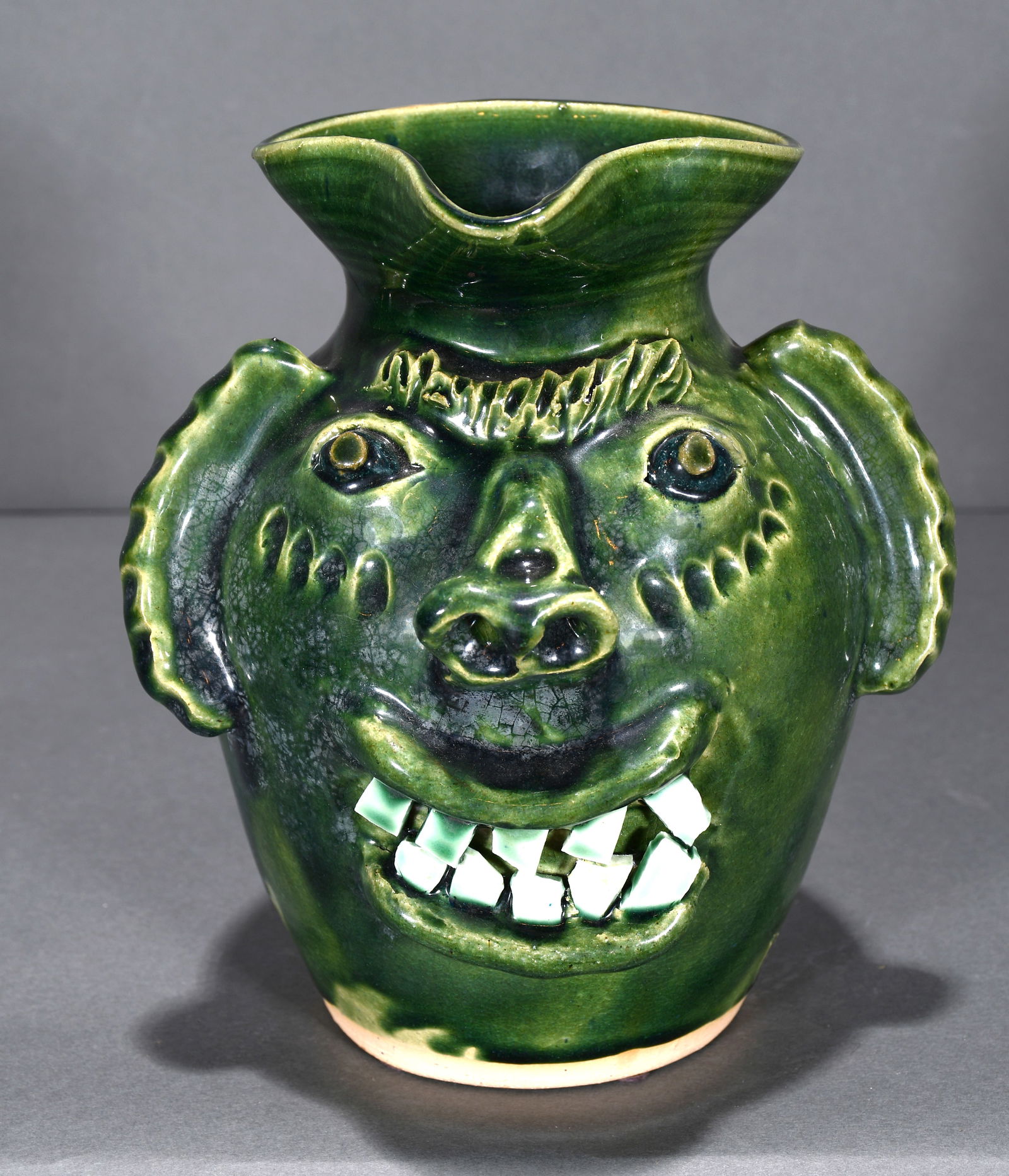 Ben Allman.  Green Face Pitcher. (1 of 3)