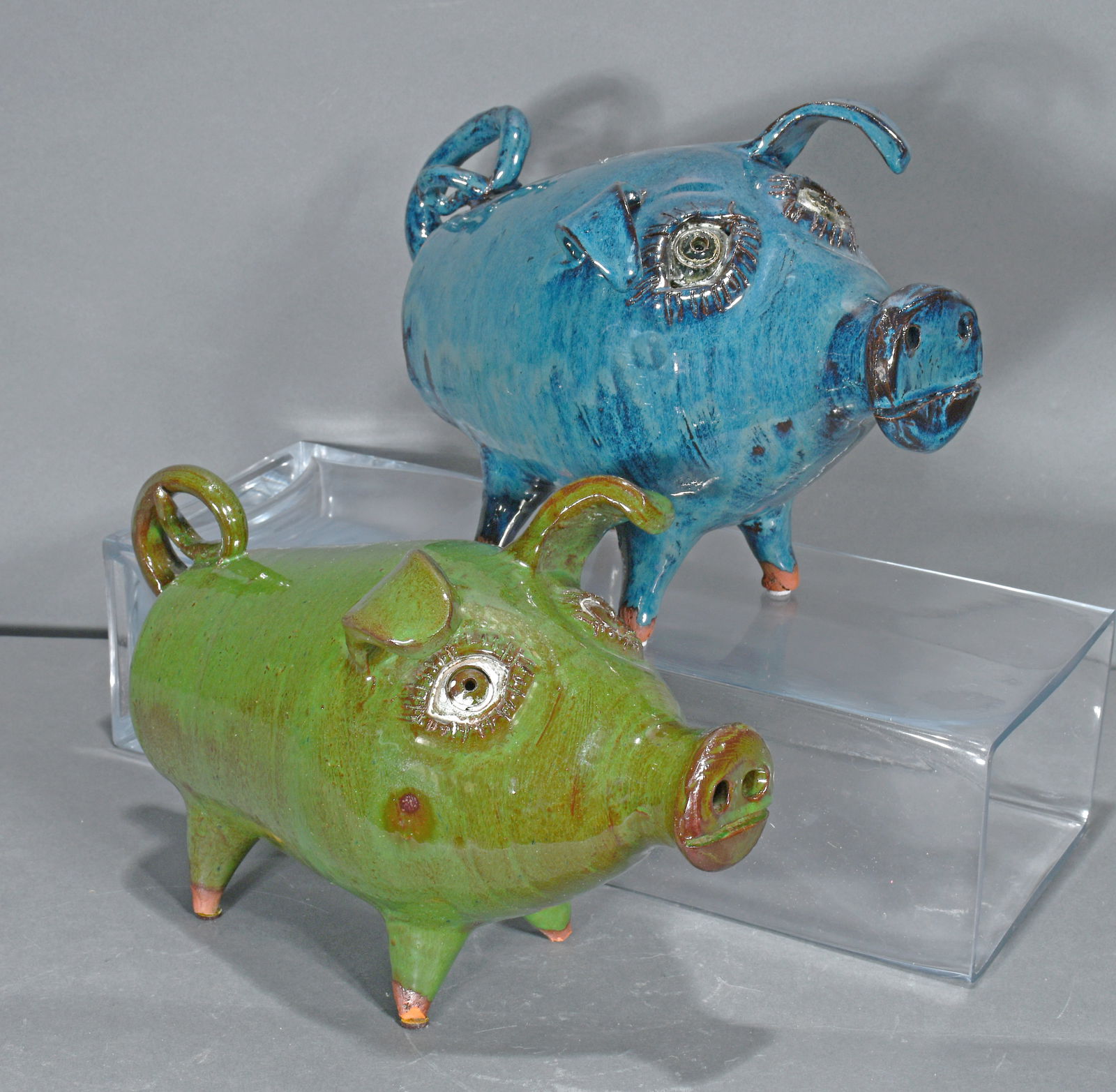 Bobby Ferguson. Green and Blue Pigs.: Bobby Ferguson. Green and Blue Pigs. 2002 and 2005. Signed and dated. Mint condition. Largest is 11" long x 7.5" h. Est. $200-300. Ship: $75